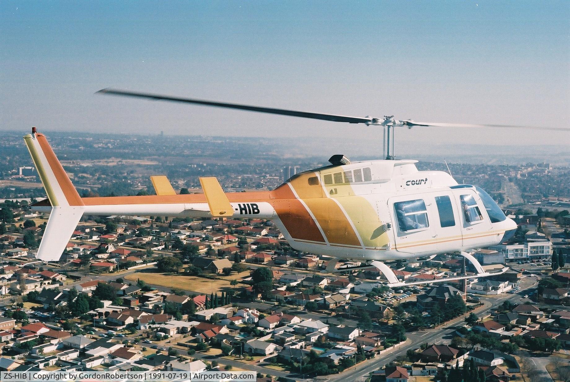 ZS-HIB, Bell 206L-1 LongRanger II C/N 45303, ZS-HIB flying over Johannesburg
