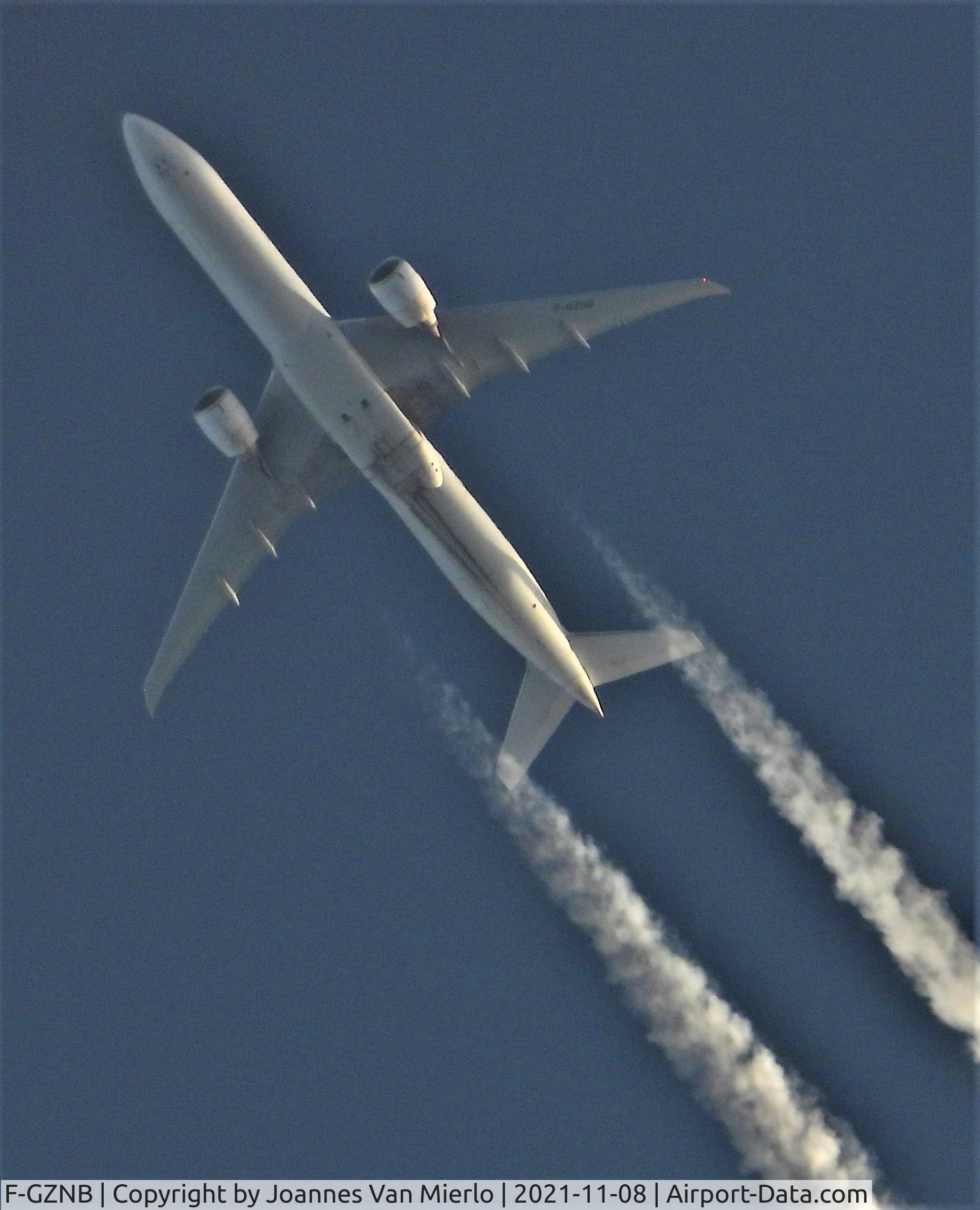 F-GZNB, 2008 Boeing 777-328/ER C/N 32964, Cruising over Belgium