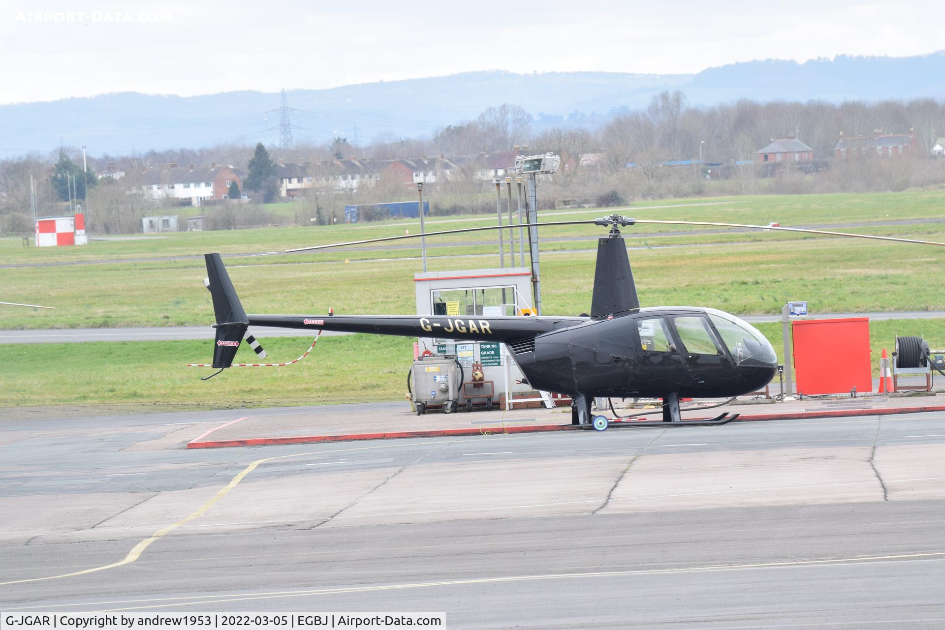 G-JGAR, 2004 Robinson R44 Raven II C/N 10513, G-JGAR at Gloucestershire Airport.