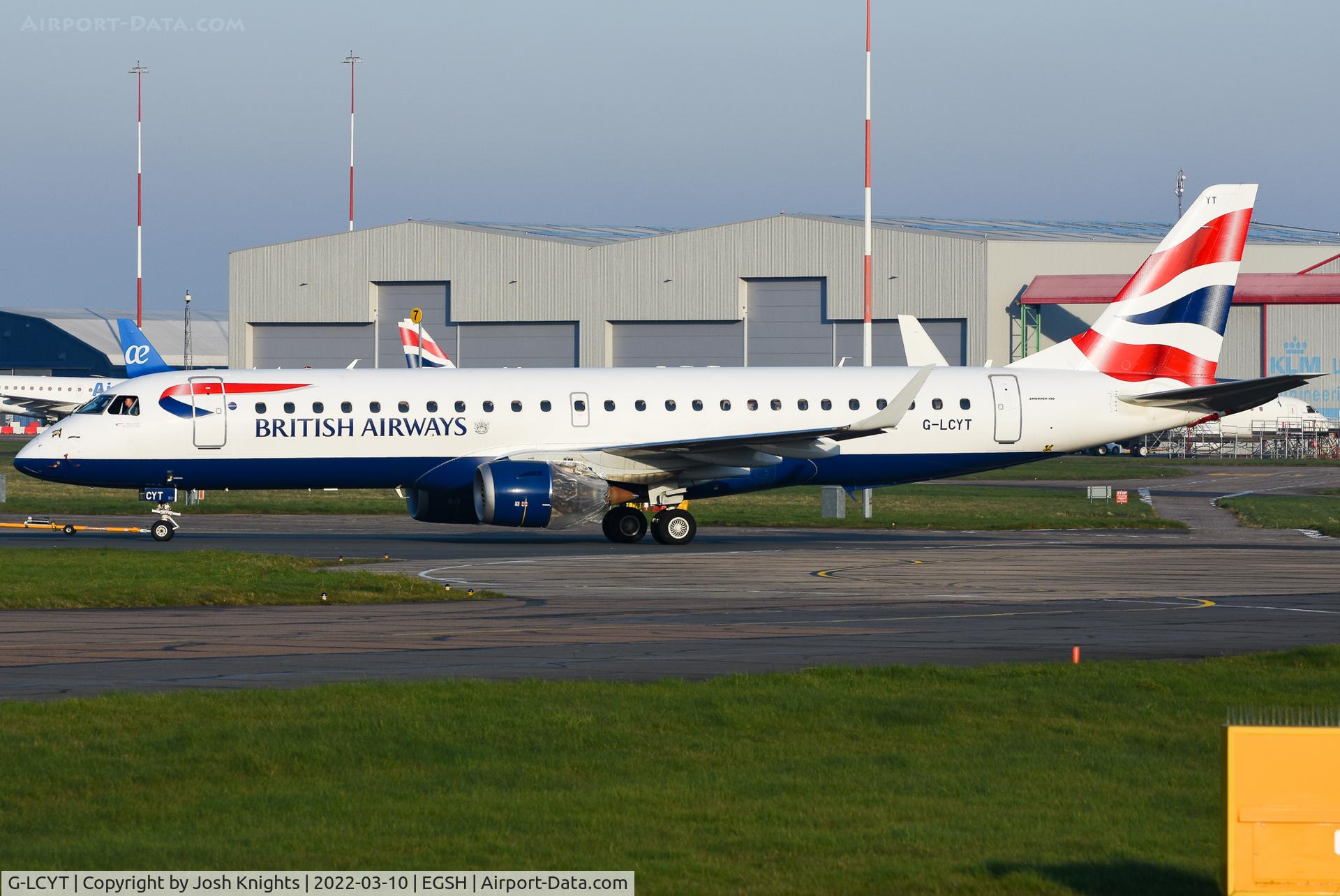 G-LCYT, 2014 Embraer 190SR (ERJ-190-100SR) C/N 19000670, On Tug To The North Side Storage Area With KLMUK Engineering.
