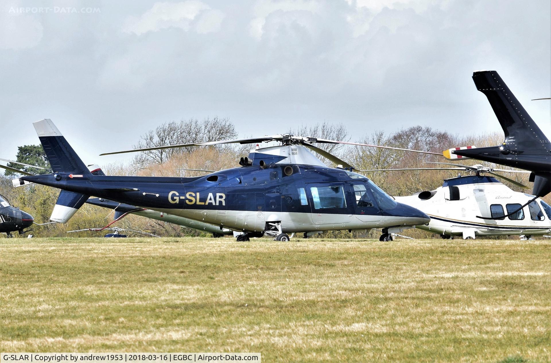 G-SLAR, 1991 Agusta A-109C C/N 7649, G-SLAR at Cheltenham Racecourse.