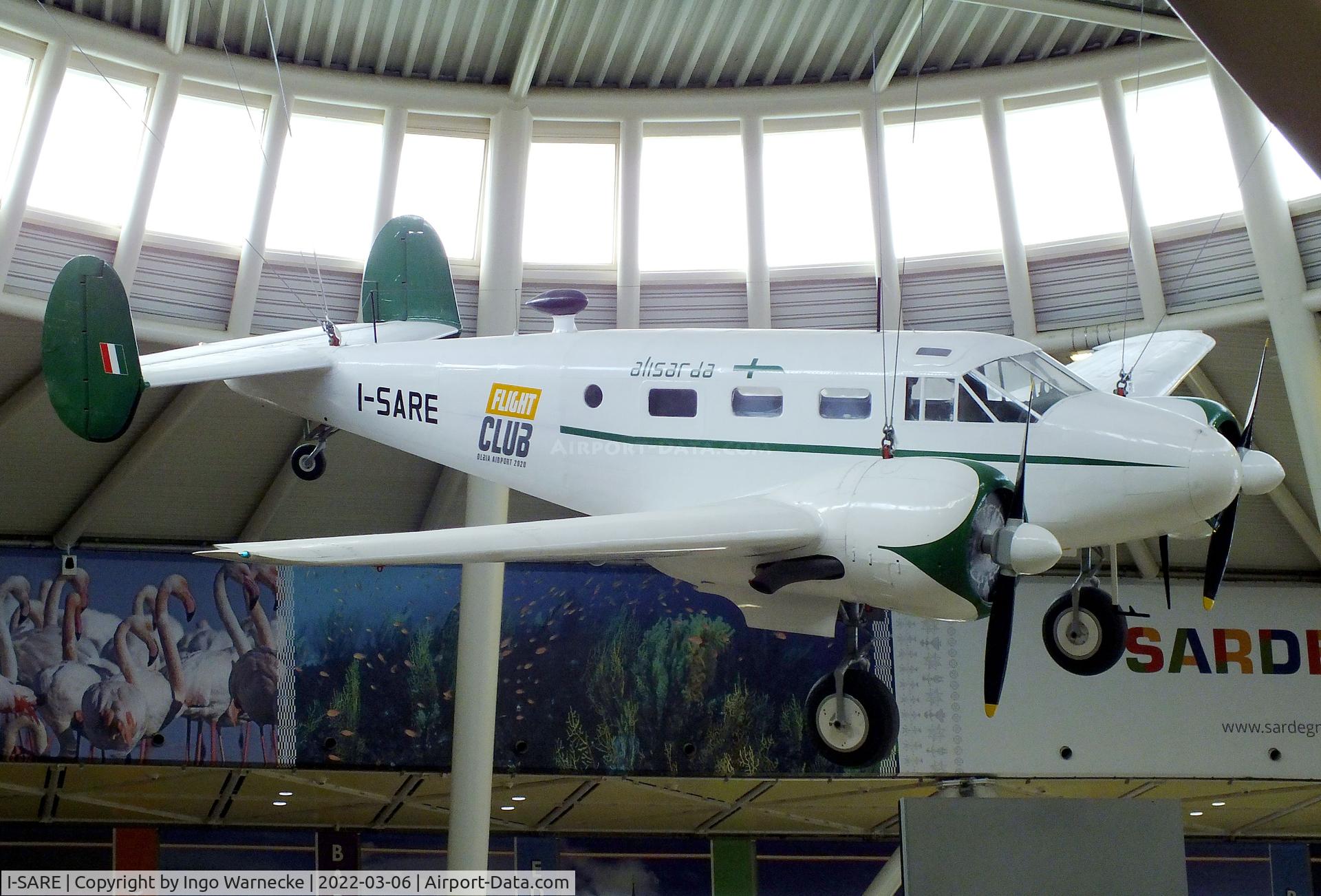I-SARE, Beech C-45F Expeditor C/N 6668, Beechcraft C-45F Expeditor, exhibited inside the terminal at Olbia Costa Smeralda Airport, Olbia