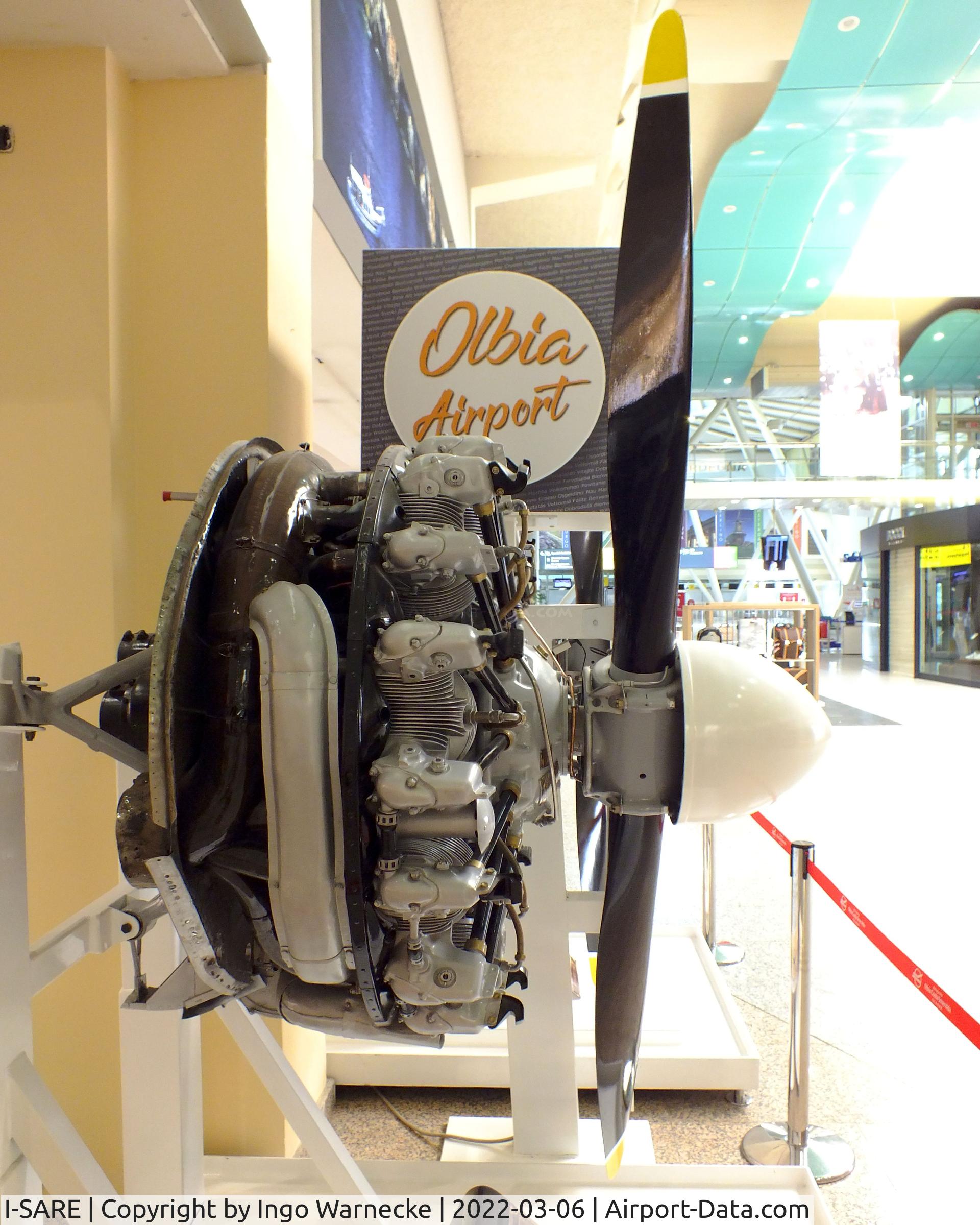 I-SARE, Beech C-45F Expeditor C/N 6668, Beechcraft C-45F Expeditor, original engines exhibited separately inside the terminal at Olbia Costa Smeralda Airport, Olbia