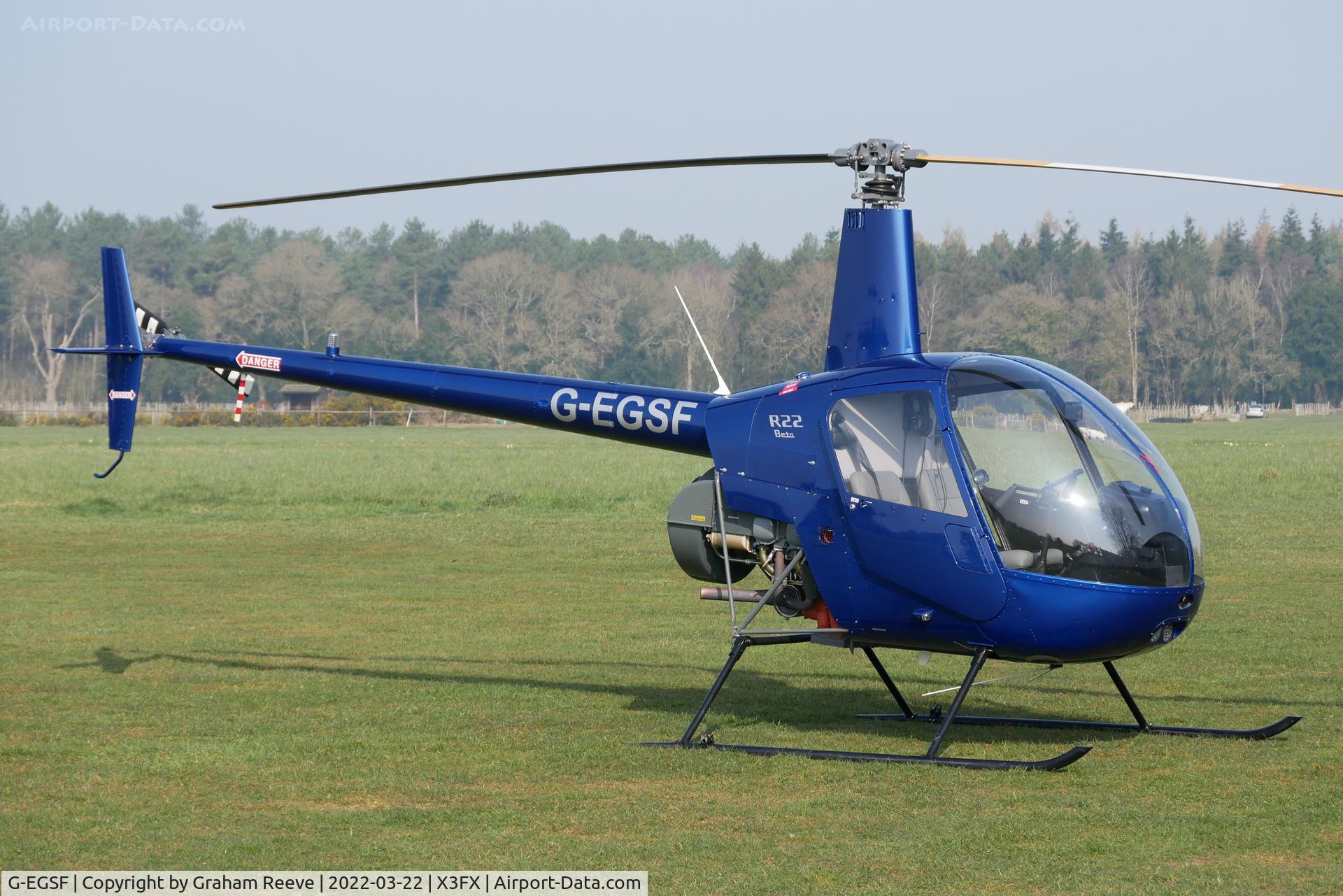 G-EGSF, 1989 Robinson R22 Beta C/N 1120, Parked at Felthorpe.