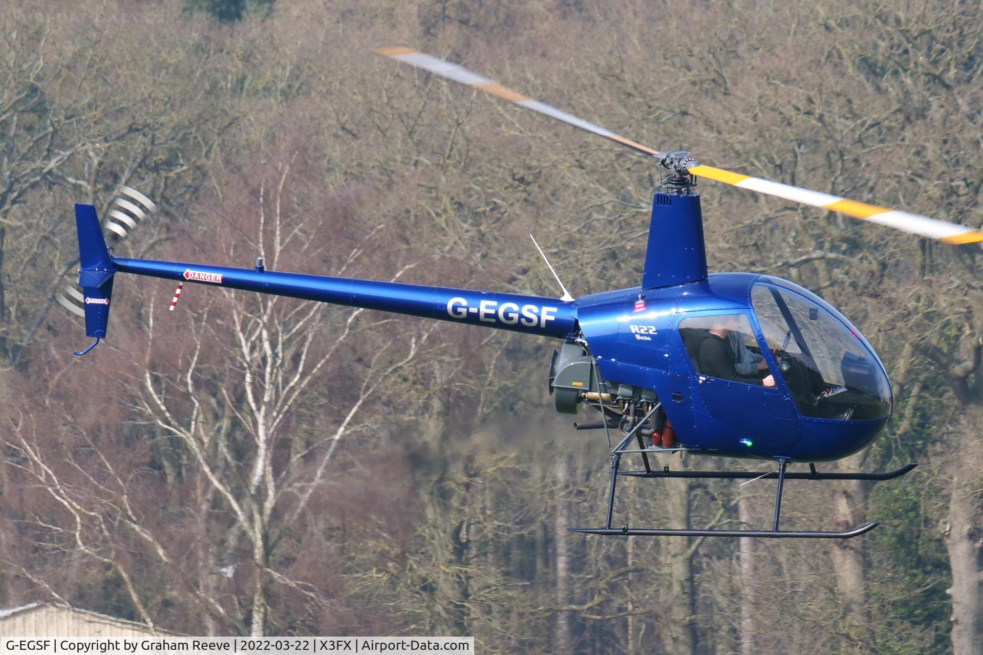G-EGSF, 1989 Robinson R22 Beta C/N 1120, Departing from Felthorpe.