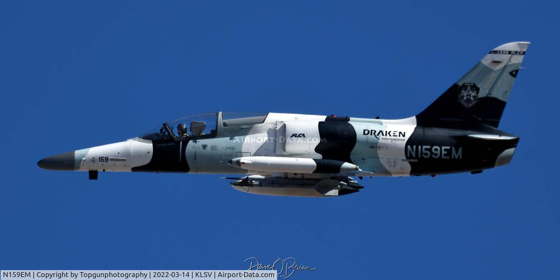 N159EM, 2001 Aero L-159E C/N 156034, Wookie1 flexes over the Vegas Raceway