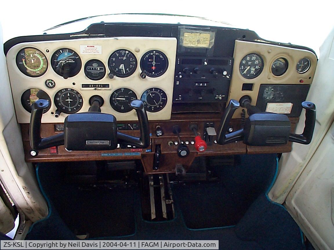 ZS-KSL, 1980 Cessna 152 C/N 15284728, Cockpit of ZA-KSL Parked at Vics Flite Centre FAGM 2004