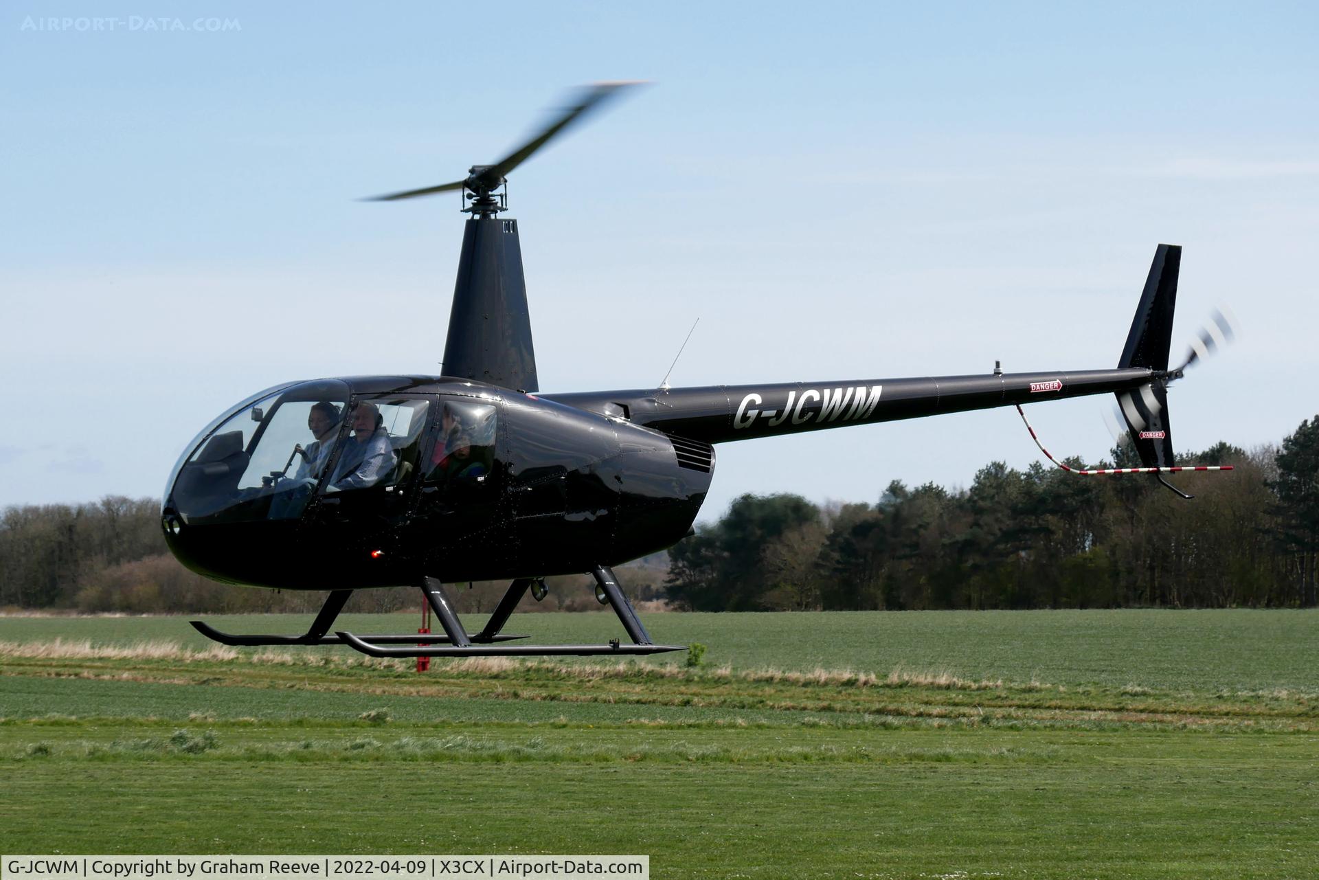 G-JCWM, Robinson R44 II C/N 11860, Departing from Northrepps.