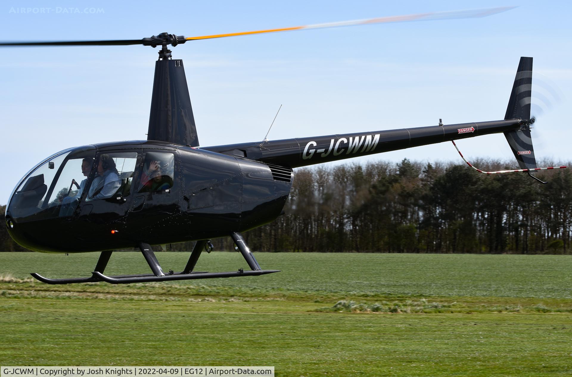 G-JCWM, Robinson R44 II C/N 11860, Departing Northrepps Airfield.