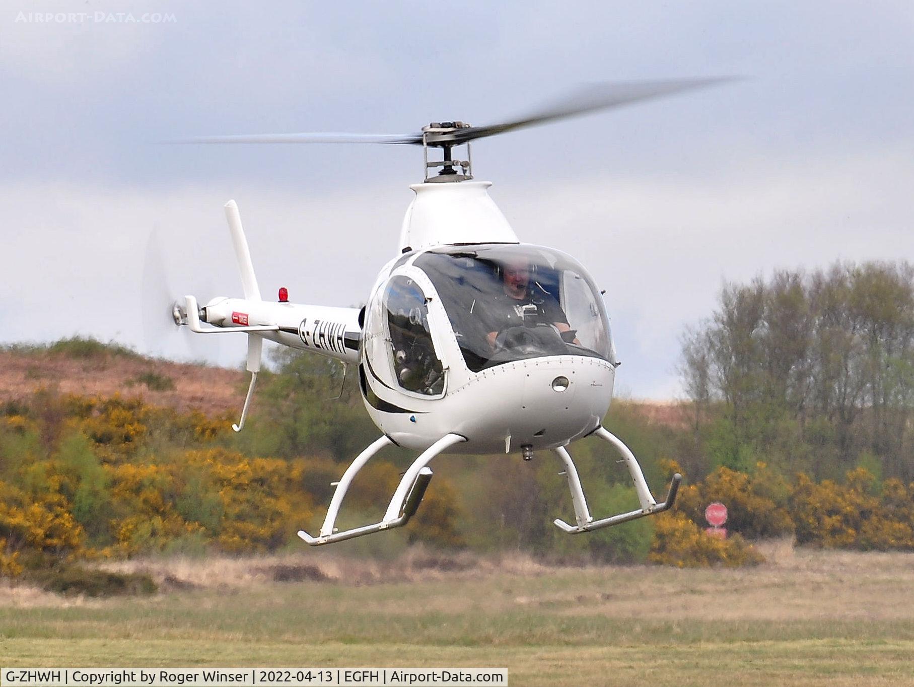 G-ZHWH, 2001 Rotorway Exec 162F C/N 6596, Visiting Rotorway helicopter arriving.