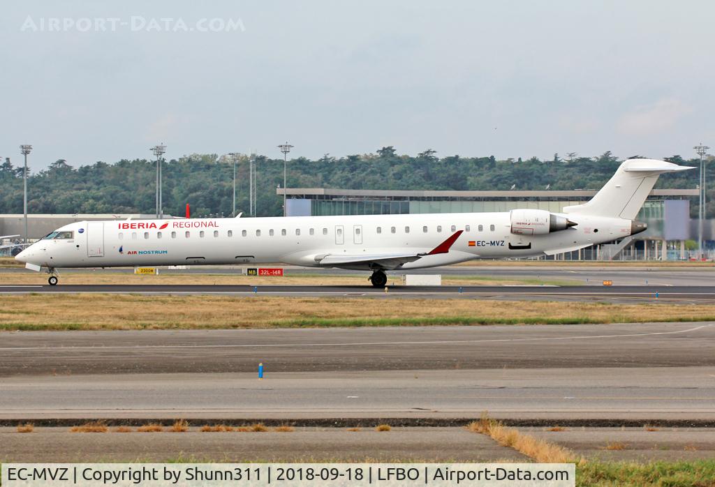 EC-MVZ, 2018 Bombardier CRJ-1000 (CL-600-2E25) C/N 19063, Ready for take off from rwy 14L in interim c/s
