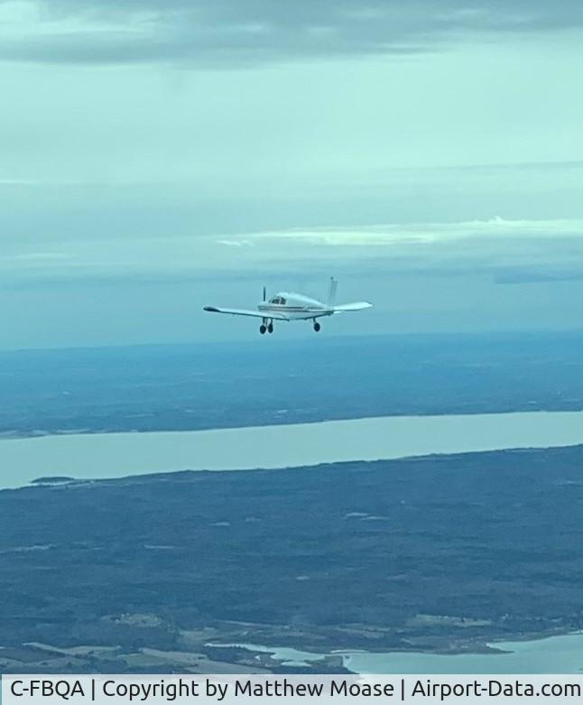 C-FBQA, 1968 Piper PA-28-140 C/N 28-24150, Cherokee in the air.