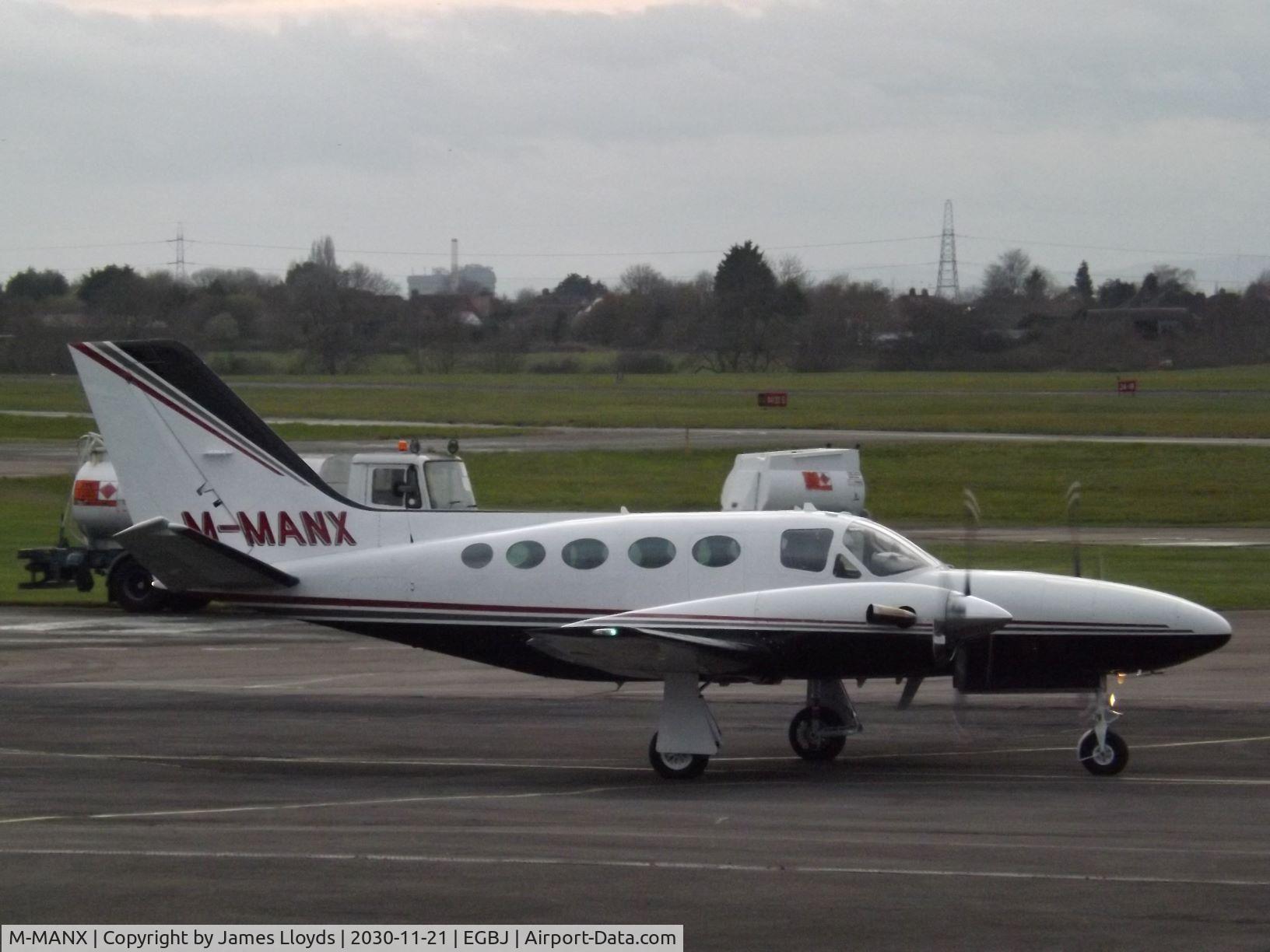 M-MANX, 1981 Cessna 425 Conquest I C/N 425-0044, At Gloucestershire Airport.