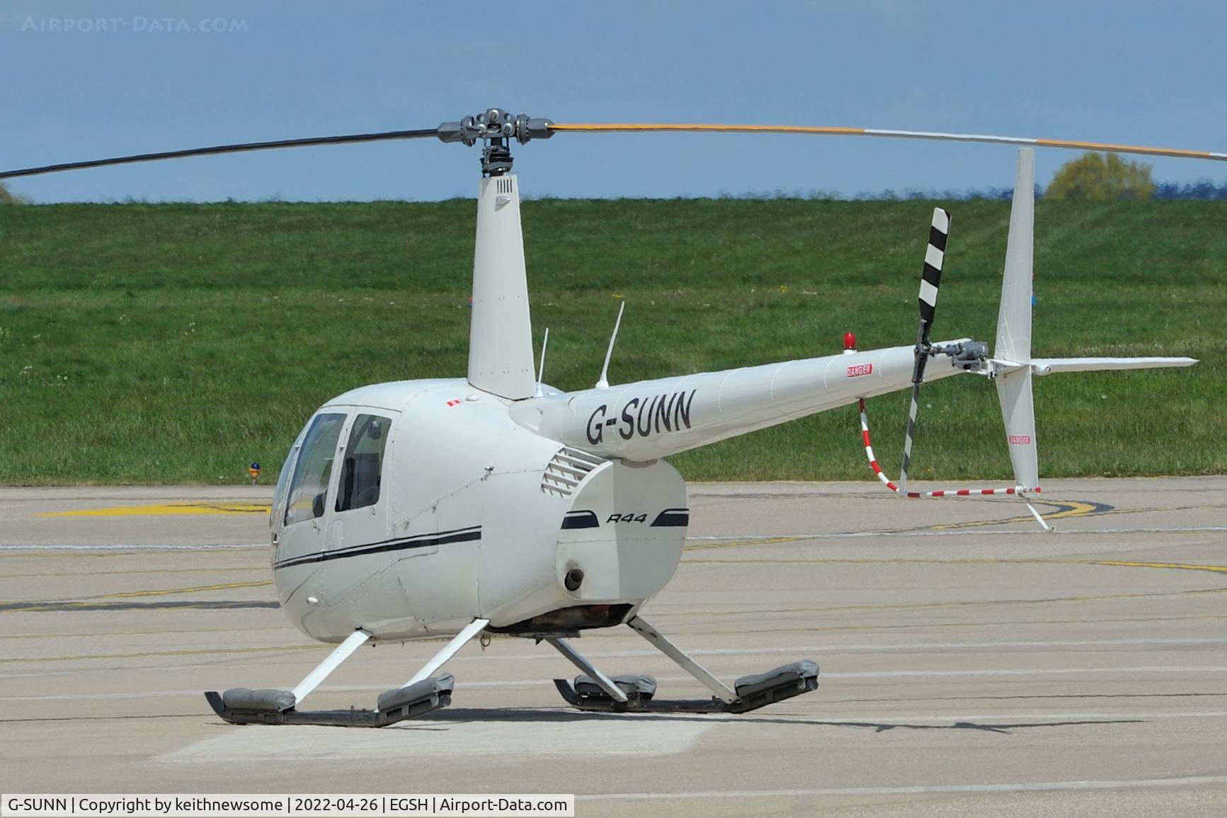 G-SUNN, 2004 Robinson R44 Clipper C/N 1367, Parked at Norwich.