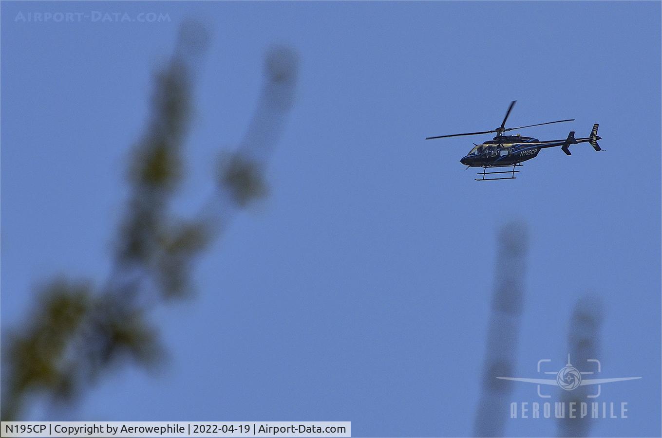 N195CP, Bell 407 C/N 53886, Flying over Bristol, TN.