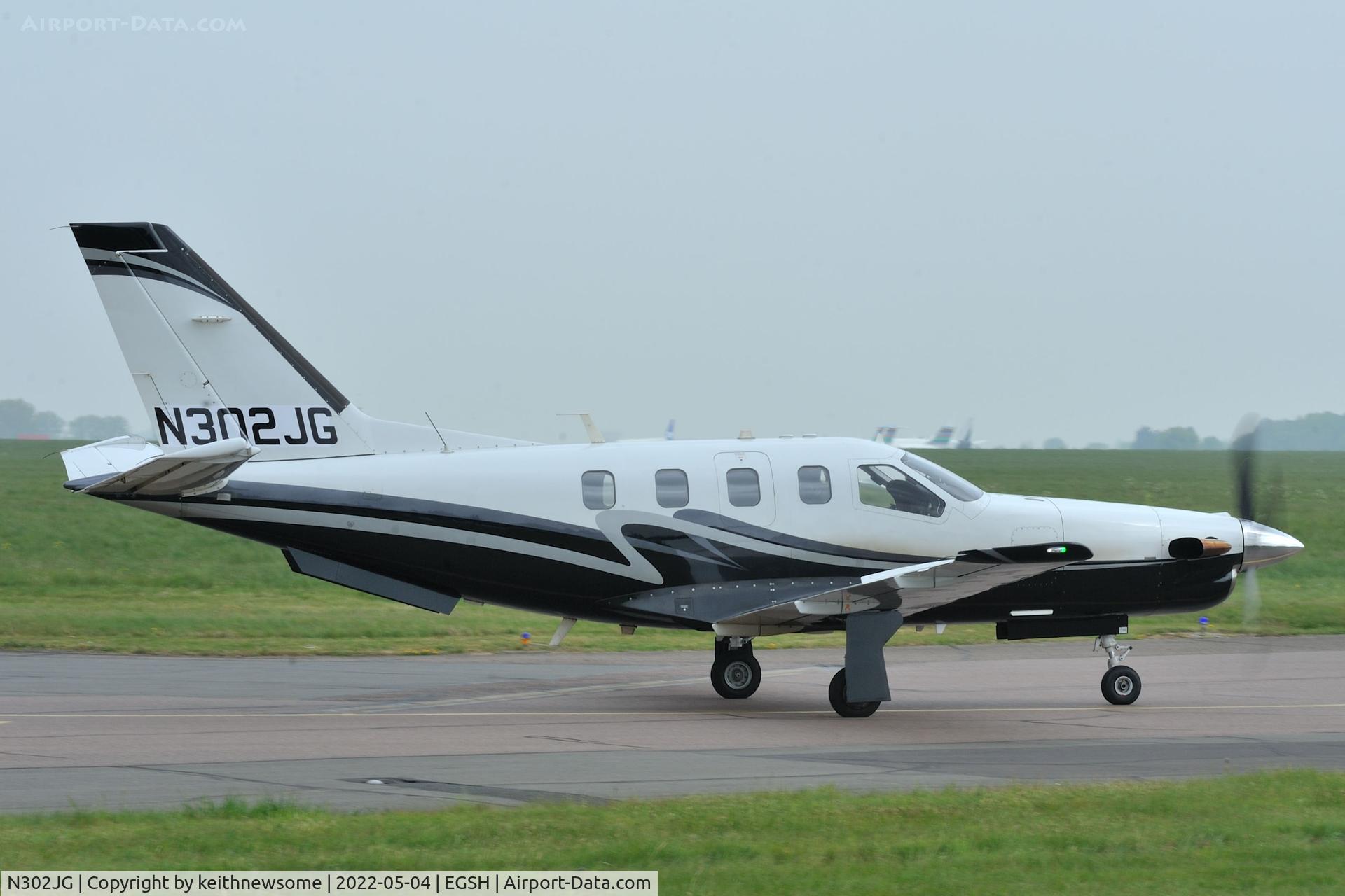 N302JG, 2004 Socata TBM-700 C/N 302, Leaving Norwich for Prestwick, Glasgow.