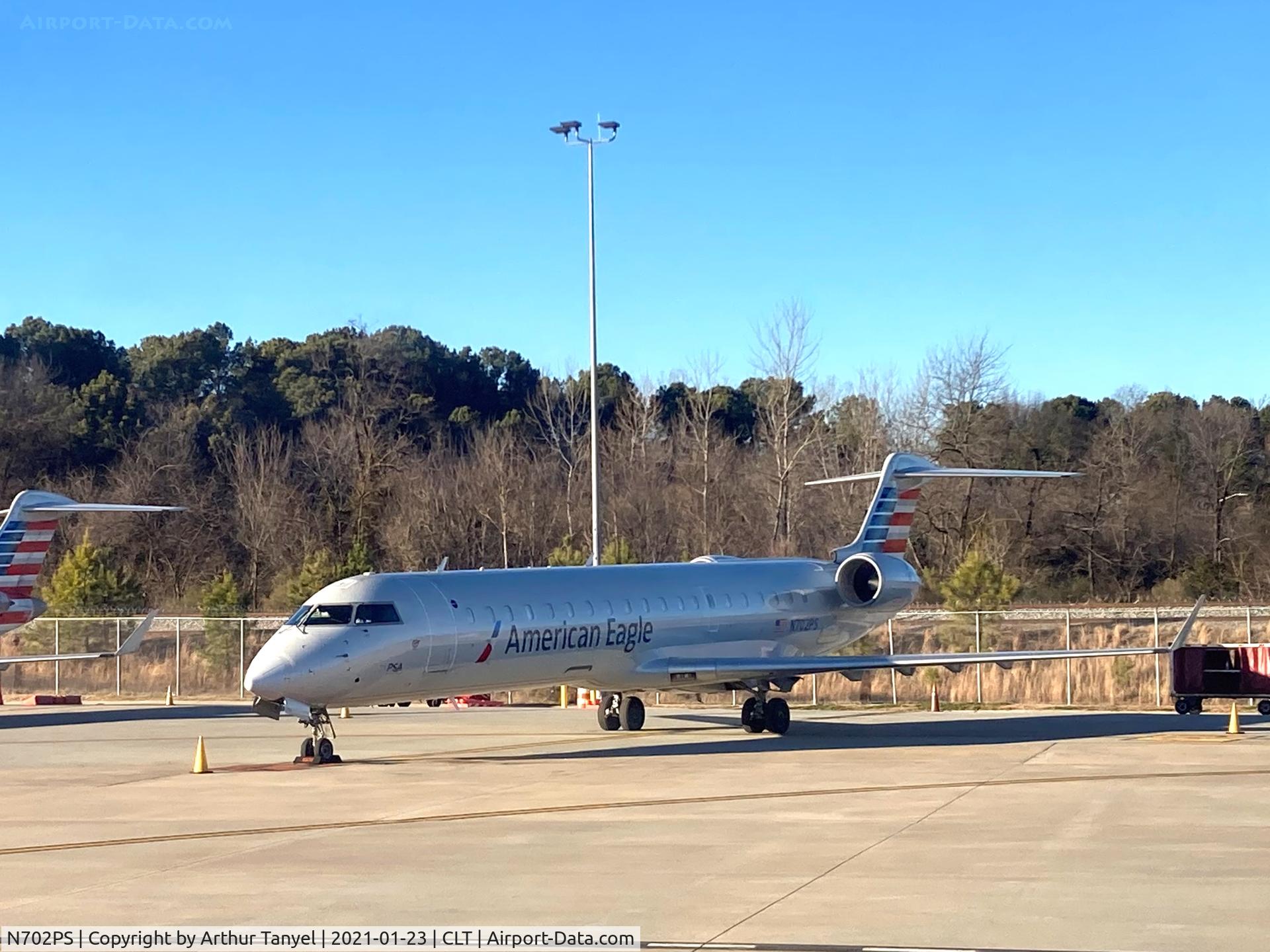 N702PS, 2004 Bombardier CRJ-701 (CL-600-2C10) Regional Jet C/N 10135, On the tarmac @ CLT