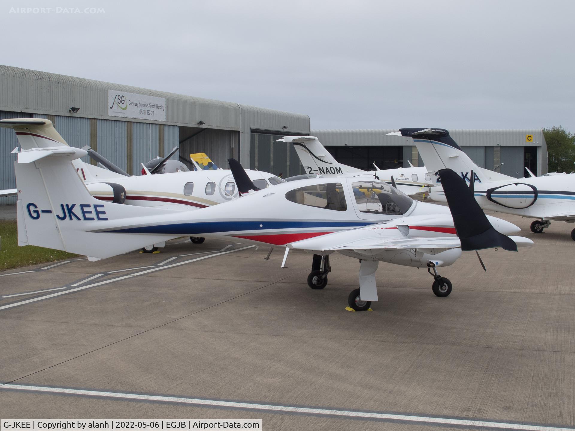 G-JKEE, 2015 Diamond DA-42NG Twin Star C/N 42.N179, On a crowded west parking area in Guernsey