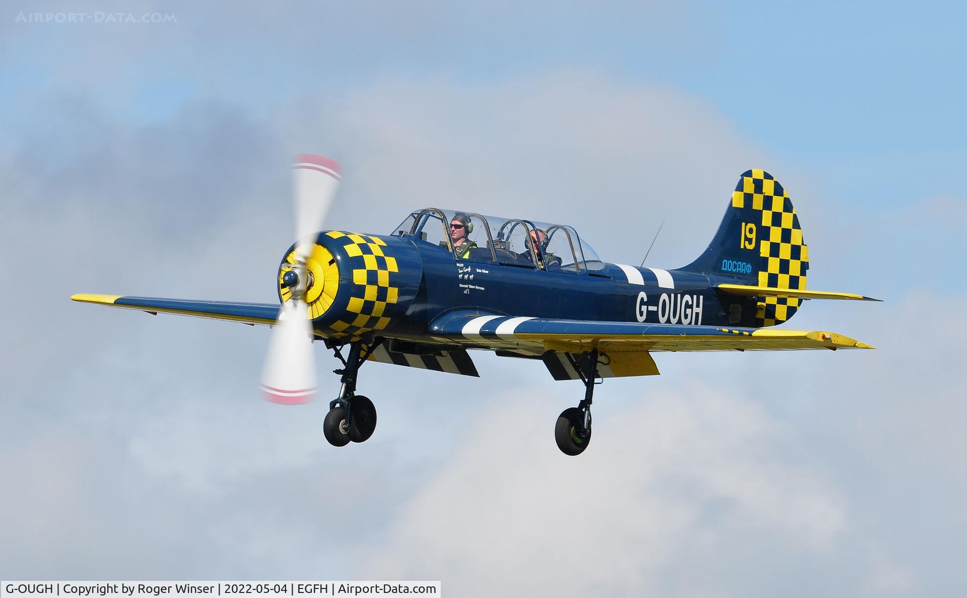 G-OUGH, 1987 Bacau Yak-52 C/N 877404, Resident Yak-52 finals to land Runway 28.