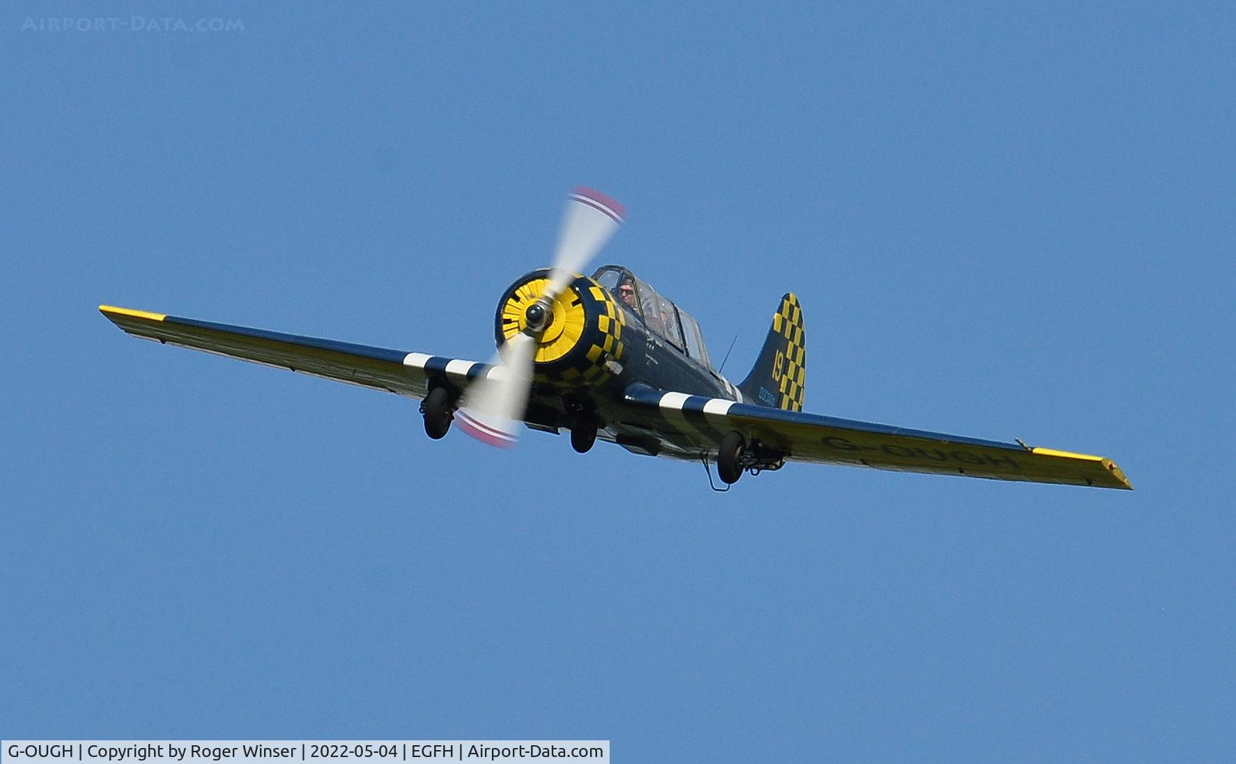 G-OUGH, 1987 Bacau Yak-52 C/N 877404, Run and break to land Runway 28.