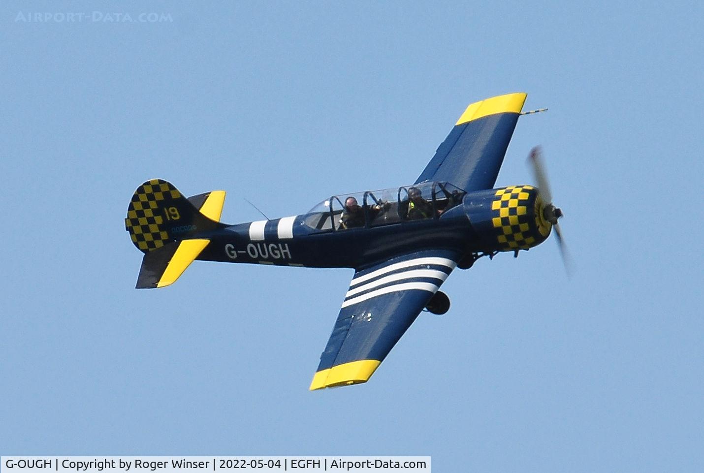G-OUGH, 1987 Bacau Yak-52 C/N 877404, Topside pass.