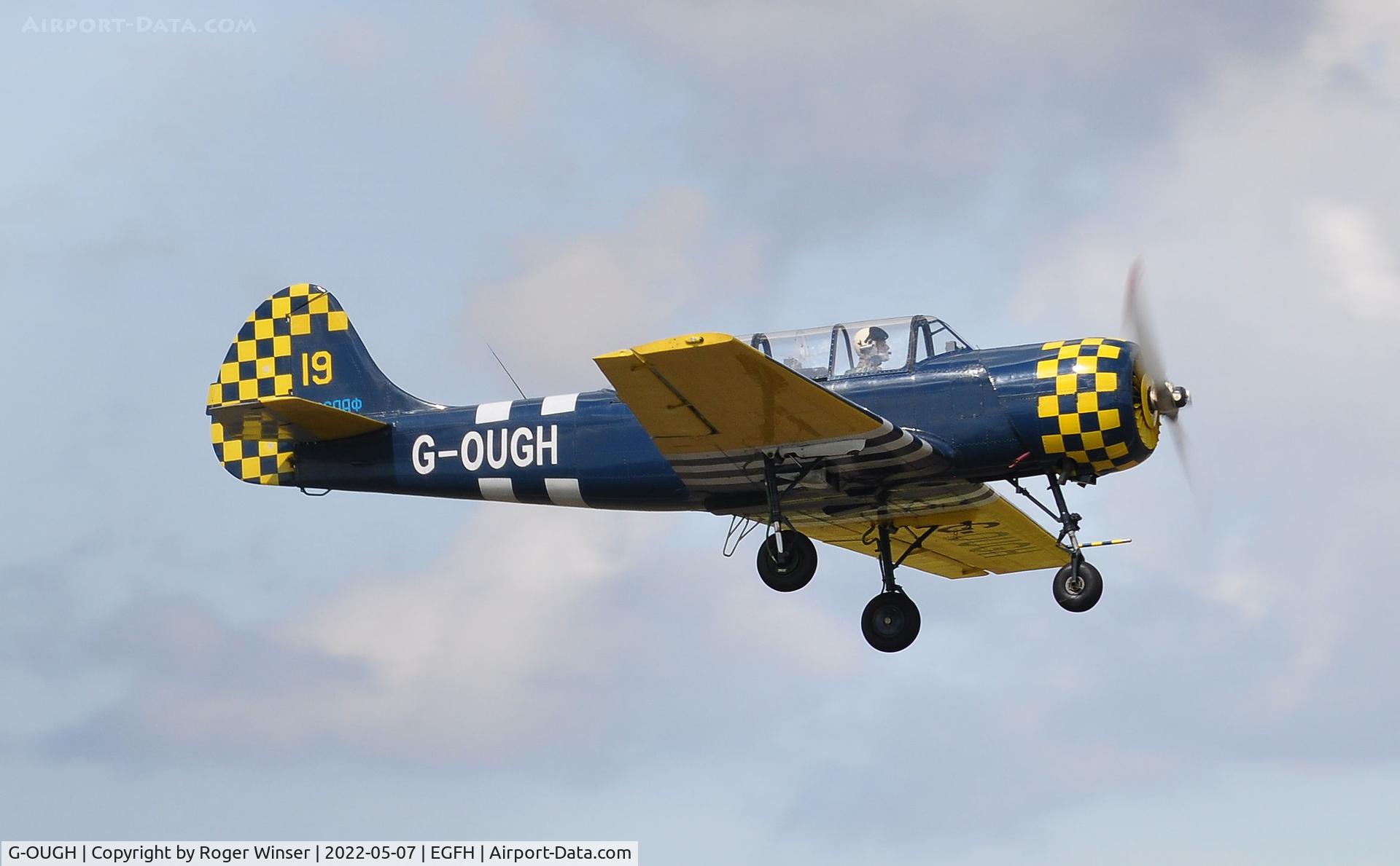 G-OUGH, 1987 Bacau Yak-52 C/N 877404, Resident Yak-52 departing Runway 04.