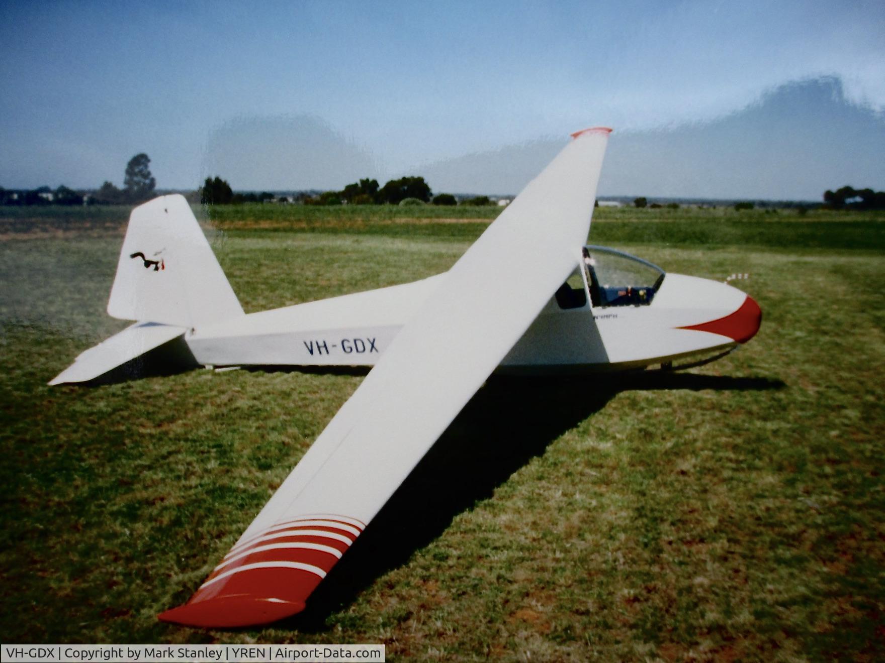 VH-GDX, 1956 Edmund Schneider Limited ES-56 Nymph II C/N 20, This photo was taken sometime around 1993 and shows GDX at Renmark Airport, home of the former Renmark Gliding Club. The dog on the rudder is from the 'Footrot Flats' cartoon series and permission was obtained from Murray Ball to place it on the aircraft.