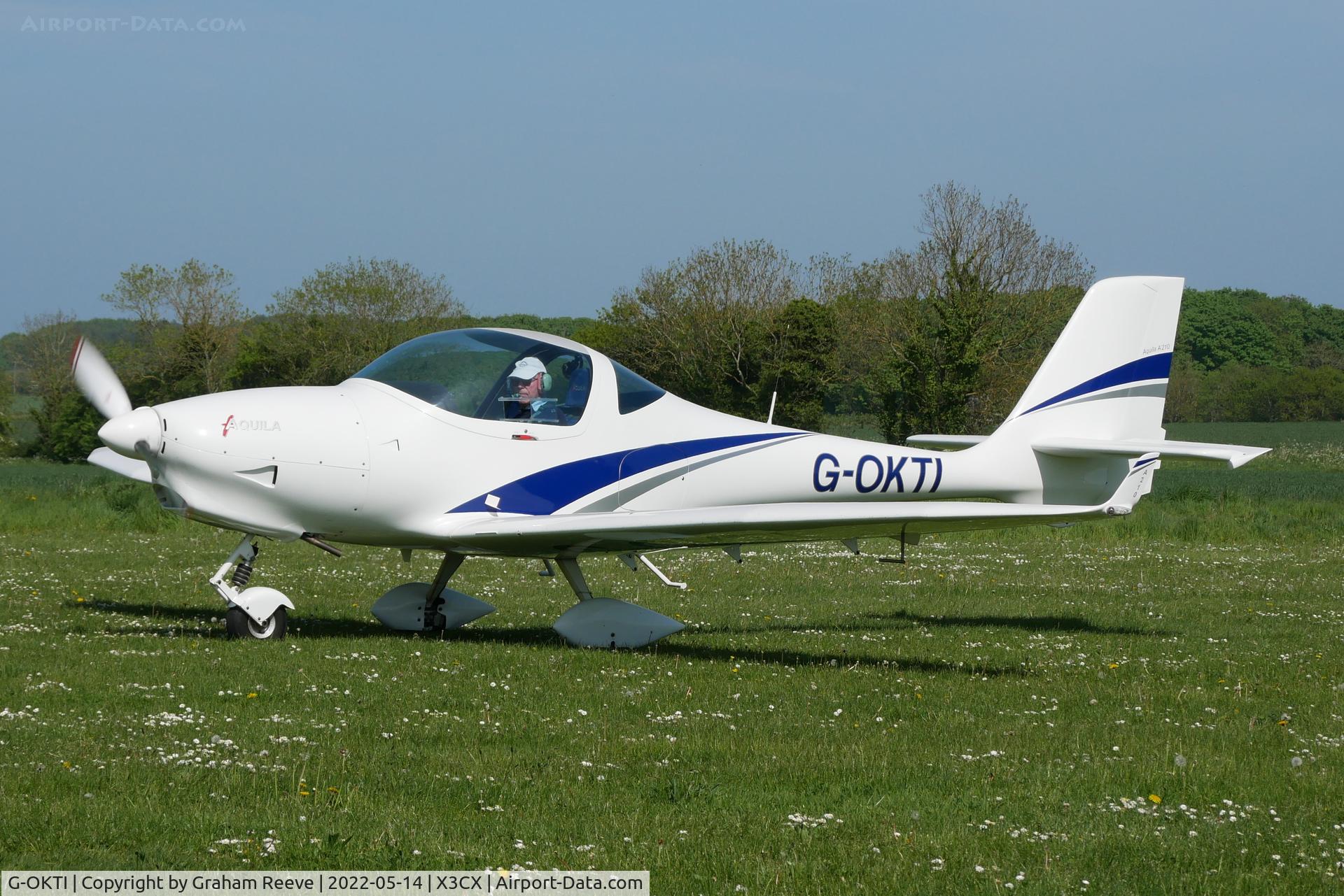 G-OKTI, 2007 Aquila A210 (AT01) C/N AT01-172, Departing from Northrepps.