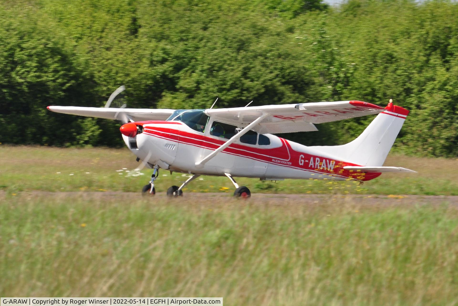 G-ARAW, 1960 Cessna 182C Skylane C/N 52843, Visiting Skylane departing Runway 22.