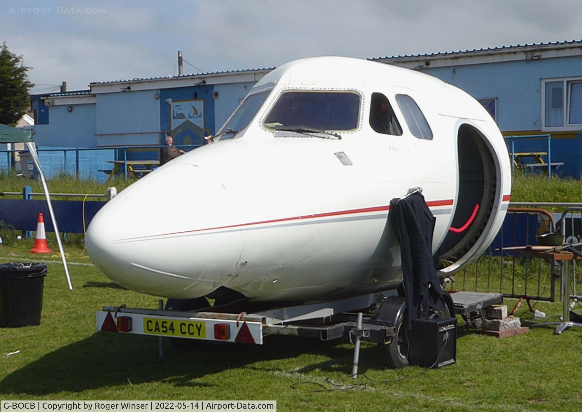 G-BOCB, 1966 Hawker Siddeley HS.125 Series 1B/522 C/N 25106, Off airport. Forward fuselage on display at Port Talbot Town Football Club, Wales, UK.