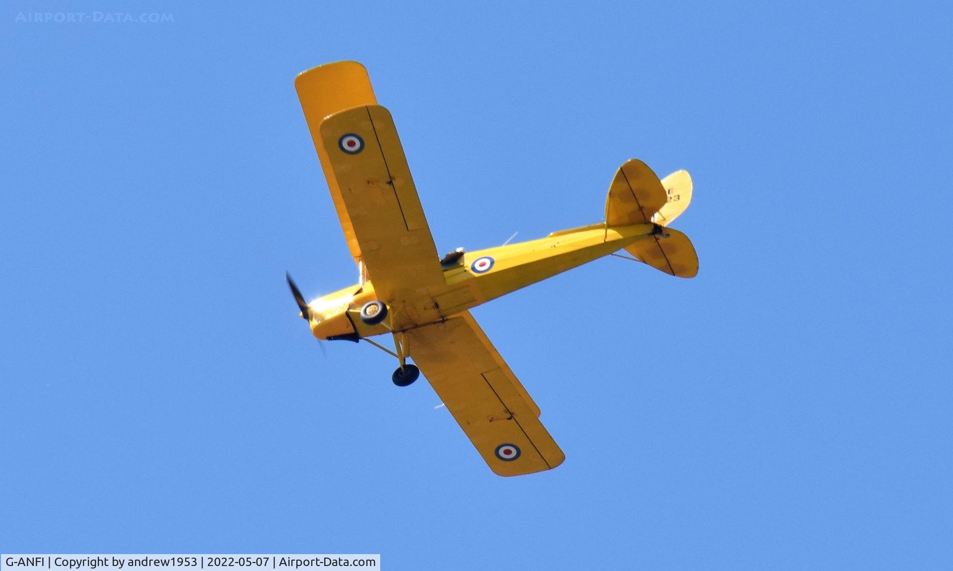G-ANFI, 1941 De Havilland DH-82A Tiger Moth II C/N 85577, G-ANFI over the Bristol Channel.