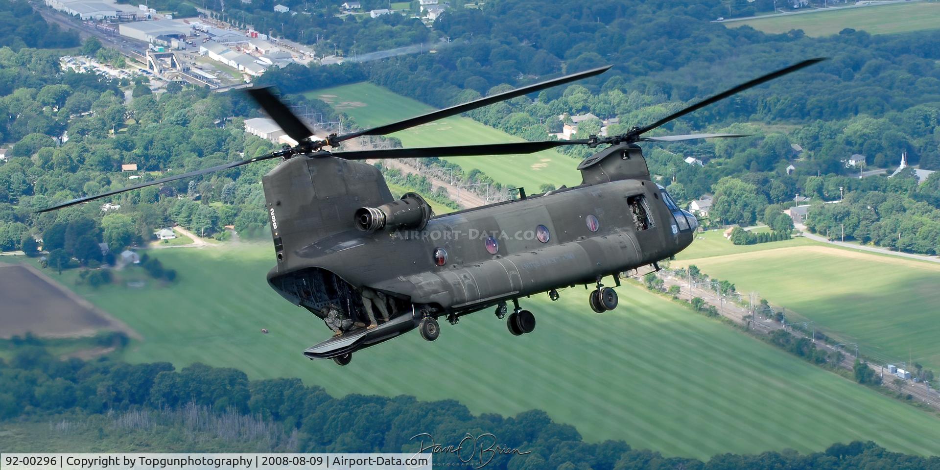 92-00296, 1993 Boeing CH-47D C/N M3437, jump master looking for the drop zone.