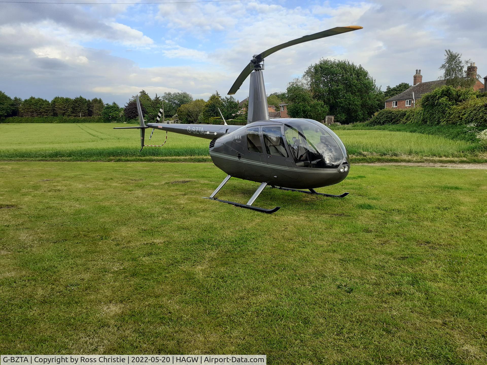 G-BZTA, 2001 Robinson R44 Raven C/N 0968, Private landing field in Hagworthingham.