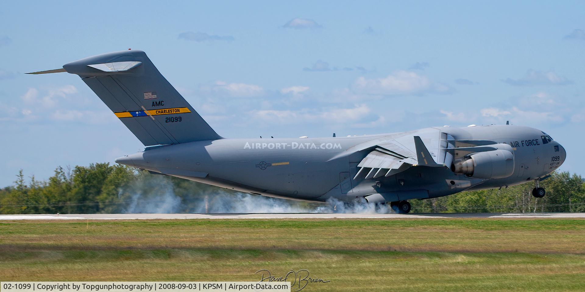 02-1099, 2002 Boeing C-17A Globemaster III C/N P-99, REACH612 lands ahead of the Wolfpack