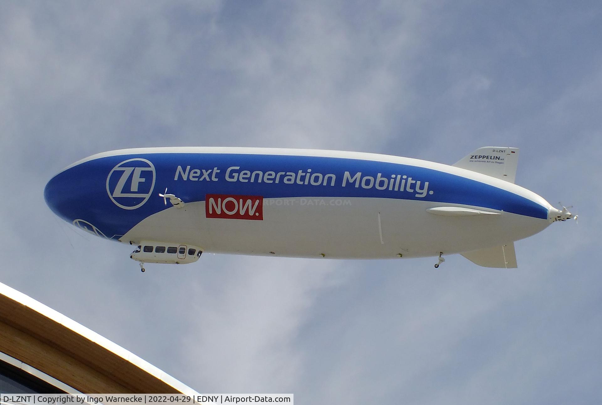 D-LZNT, 2007 Zeppelin LZ N07 C/N 4, Zeppelin NT - Deutsche Zeppelin Reederei over the trade fairground at Friedrichshafen airport during the AERO 2022