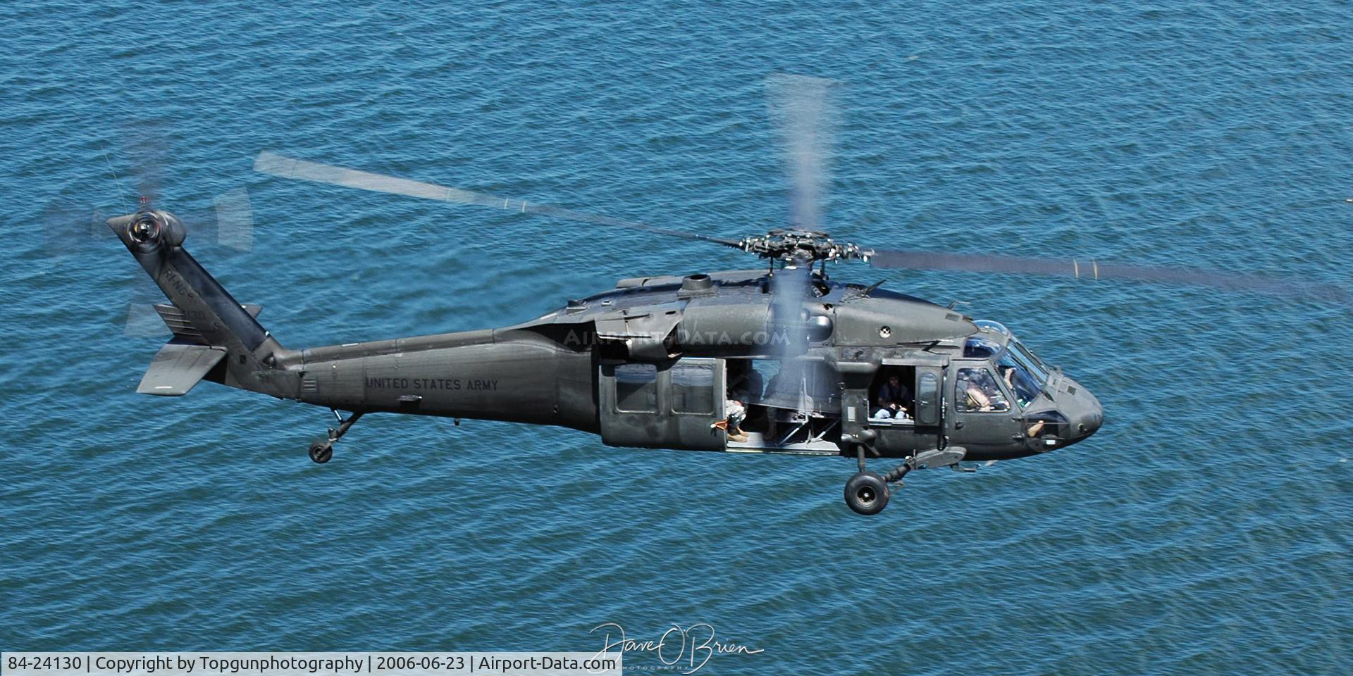 84-24130, 1984 Sikorsky UH-60A Blackhawk C/N 71.0094, flying over Narragansett Bay waiting to turn inbound