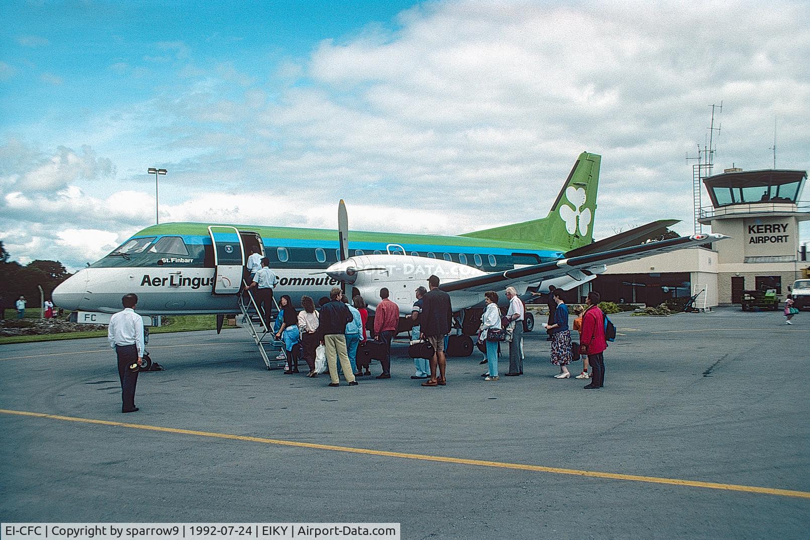 EI-CFC, 1991 Saab 340B C/N 340B-255, Boarding th flight to Dublin from Kerry. Scanned from a slide.