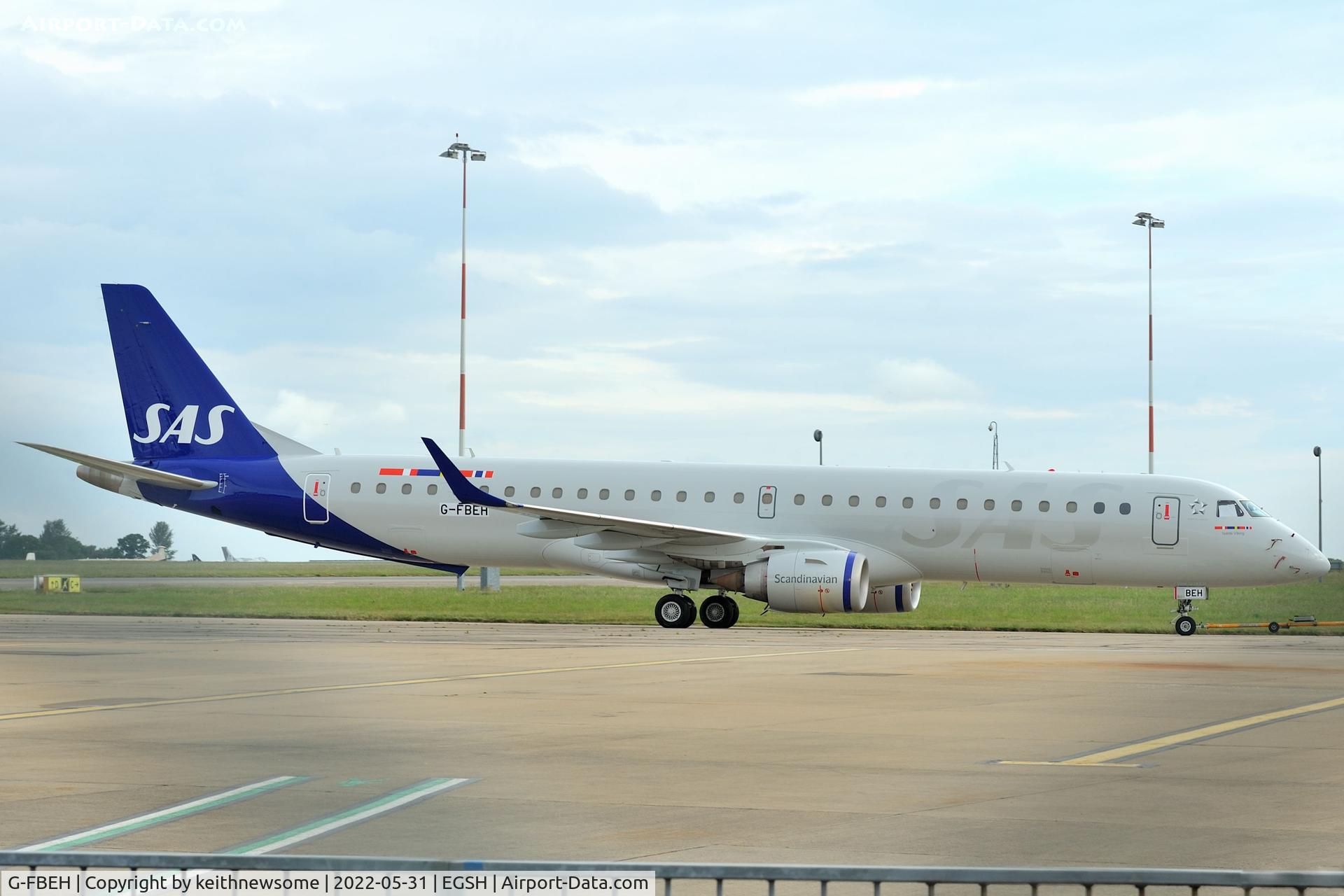G-FBEH, 2007 Embraer 195LR (ERJ-190-200LR) C/N 19000128a, Storage movement with SAS Link colour scheme.