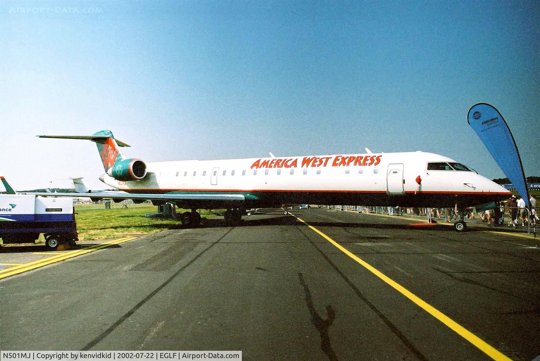 N501MJ, 2002 Canadair CL-600-2C10 Regional Jet CRJ-700 C/N 10047, At Farnborough International 2002.