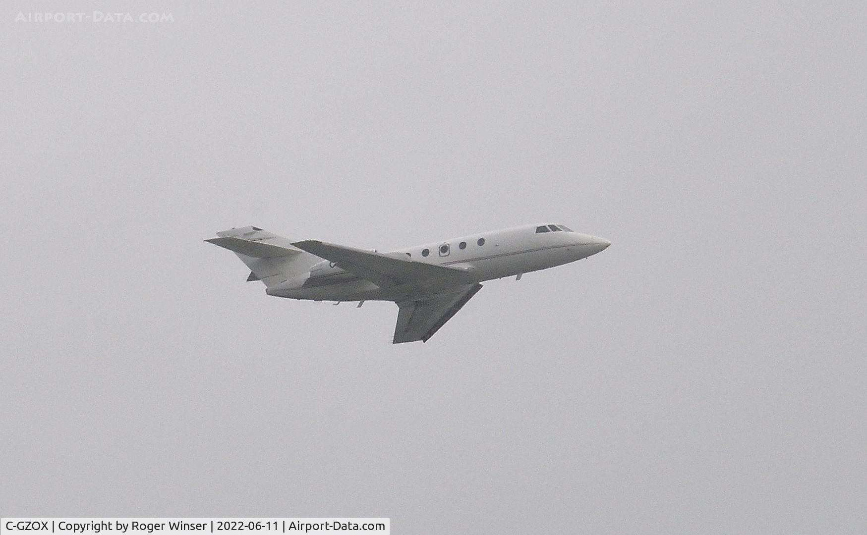 C-GZOX, 1982 Dassault Fan Jet Falcon (20F) C/N 463, Off airport  Falcon 20F operated by Air Nunavut approaching Runway 22 at Swansea Airport, Wales, UK having departed Gander Airport, Canada.