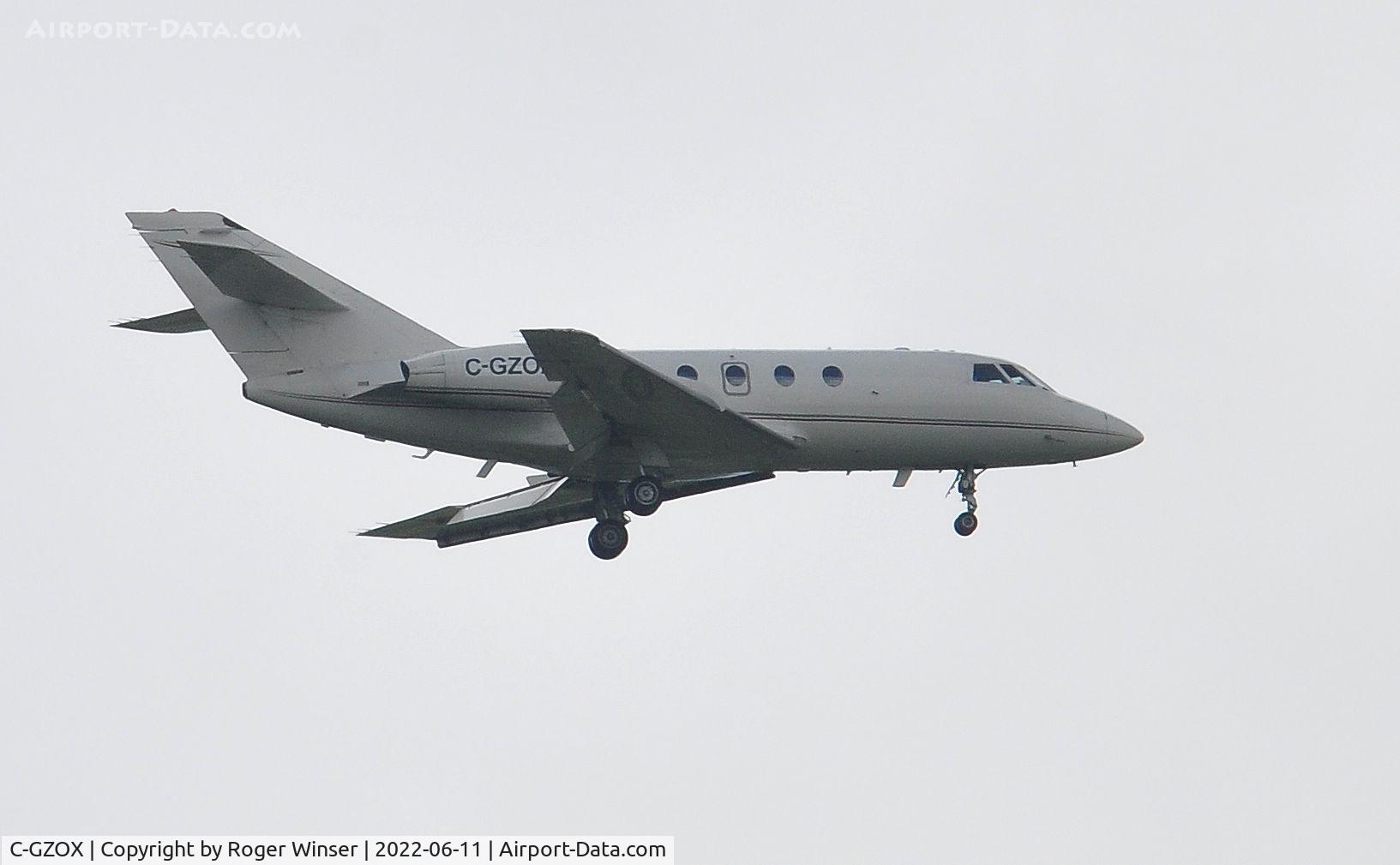 C-GZOX, 1982 Dassault Fan Jet Falcon (20F) C/N 463, Off airport. Falcon F20 operated by Air Nunavut finals to land Runway 22 at Swansea Airport, Wales, UK.