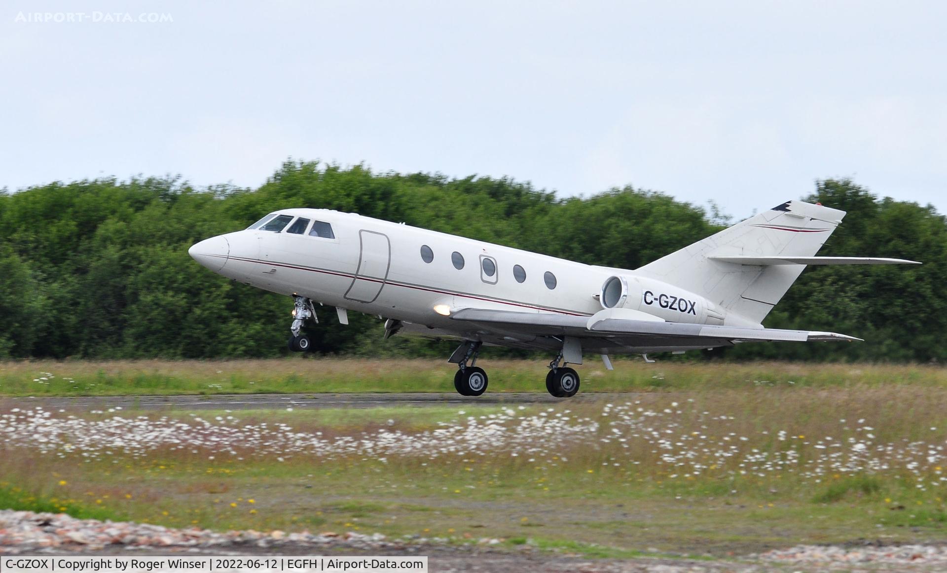 C-GZOX, 1982 Dassault Fan Jet Falcon (20F) C/N 463, Visiting bizjet departing Runway 22.