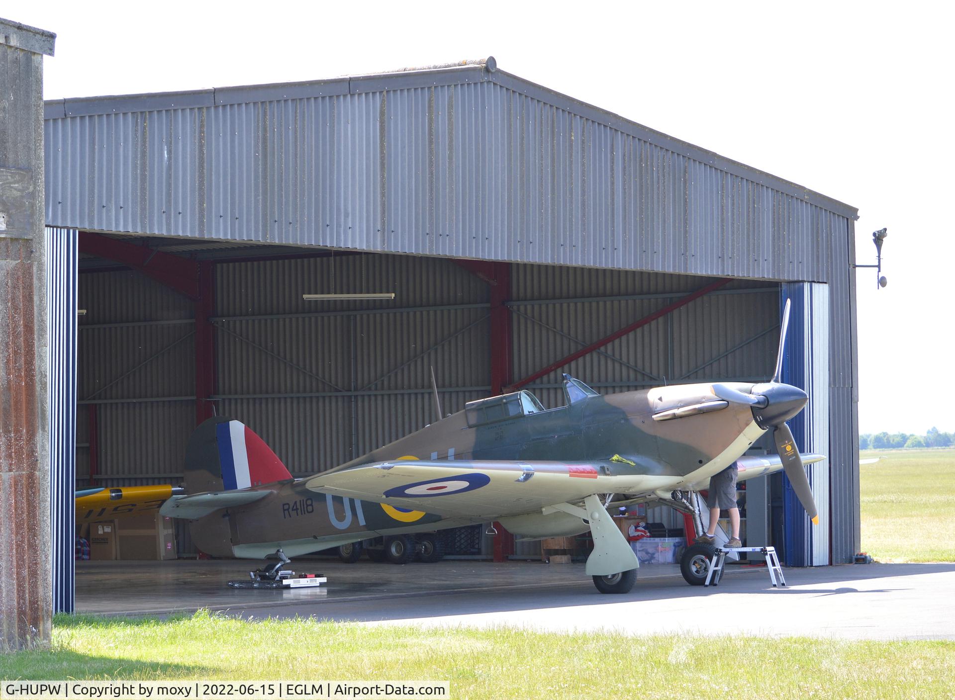 G-HUPW, 1940 Hawker Hurricane I C/N G592301, Hawker Hurricane I receiving attention at White Waltham.