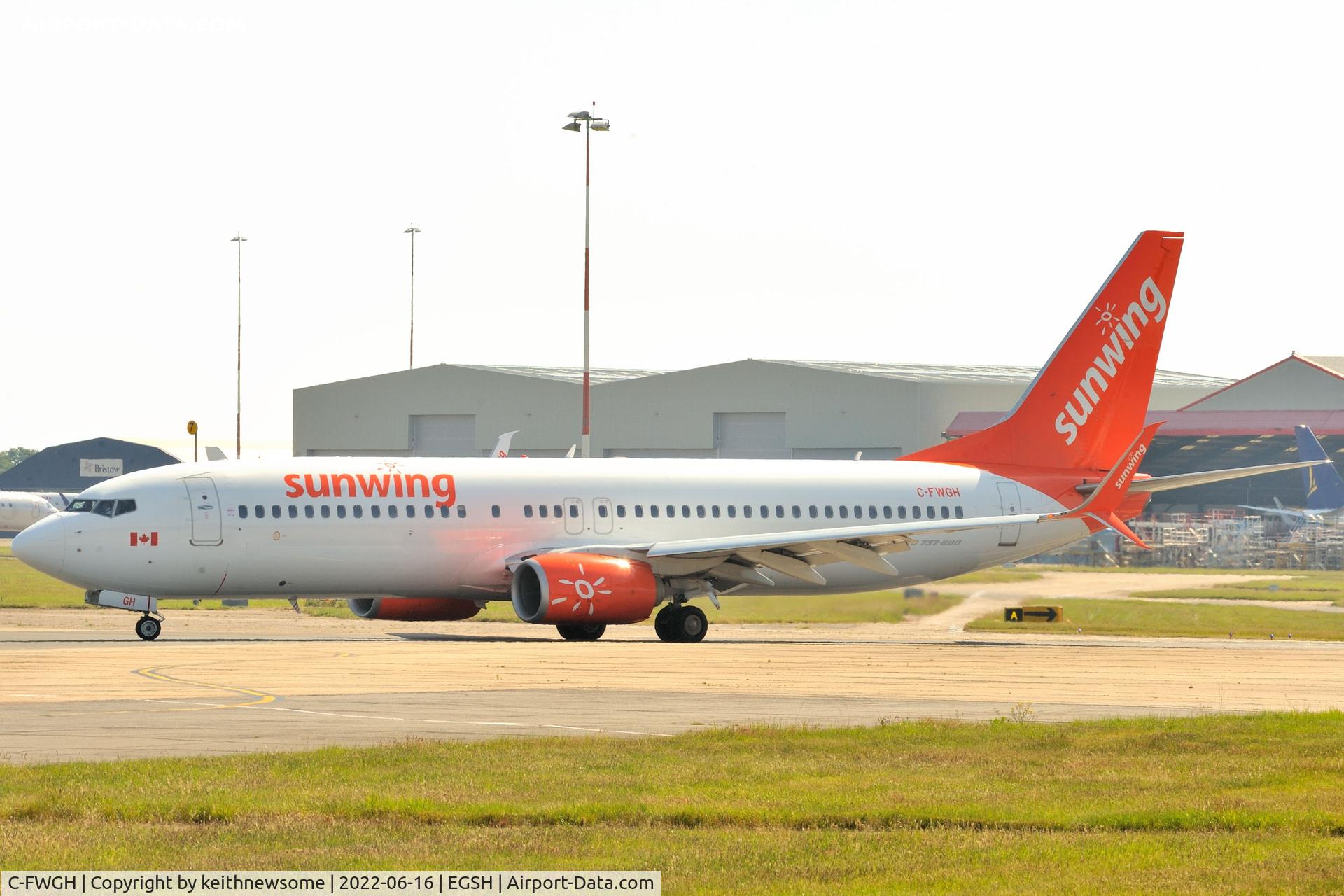 C-FWGH, 2011 Boeing 737-86J C/N 37752, Leaving Norwich for Cyprus with new titles and colour coordinated engine cowlings.