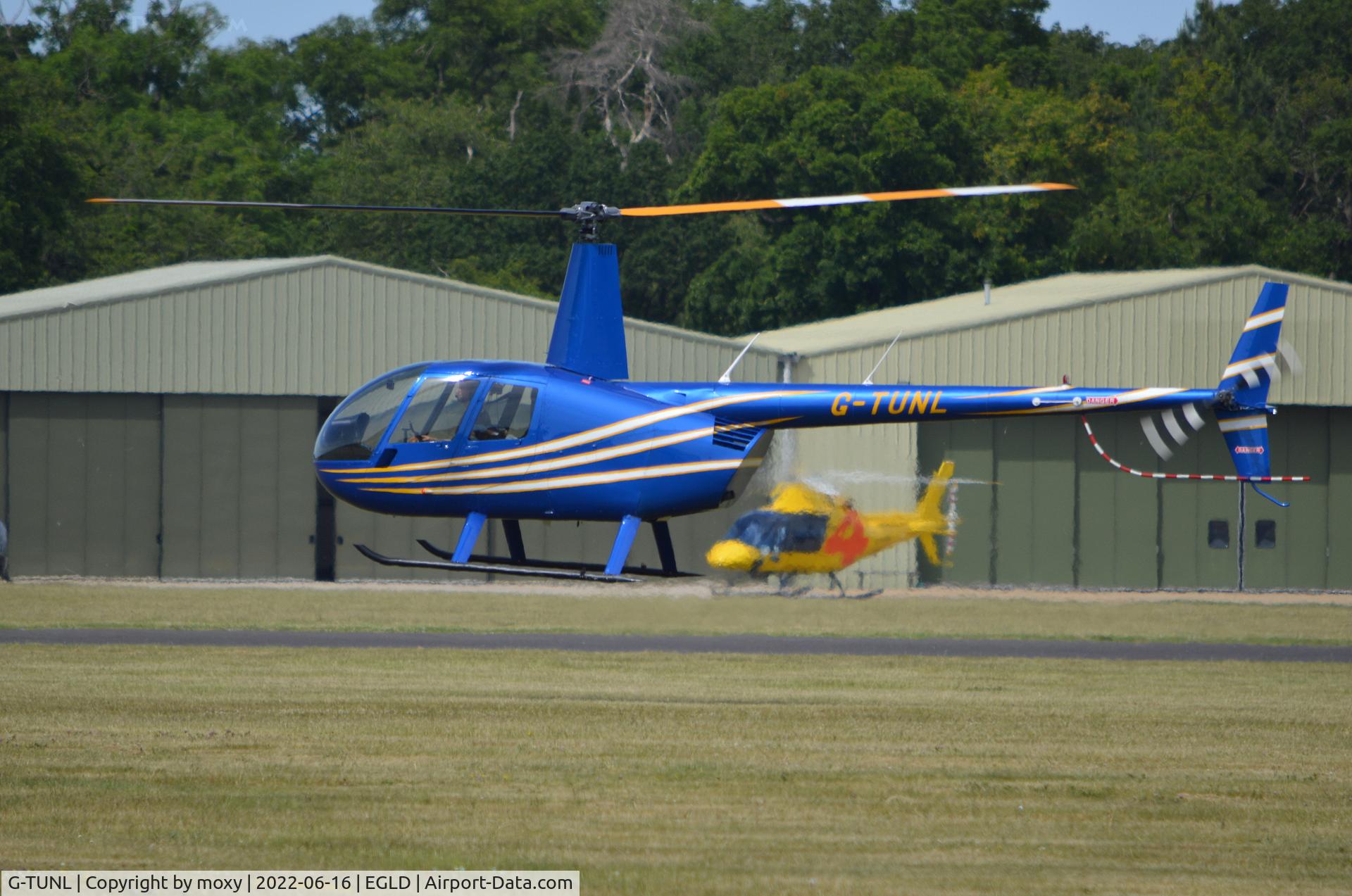 G-TUNL, 2007 Robinson R44 Raven II C/N 11628, Robinson R44 Raven II at Denham.