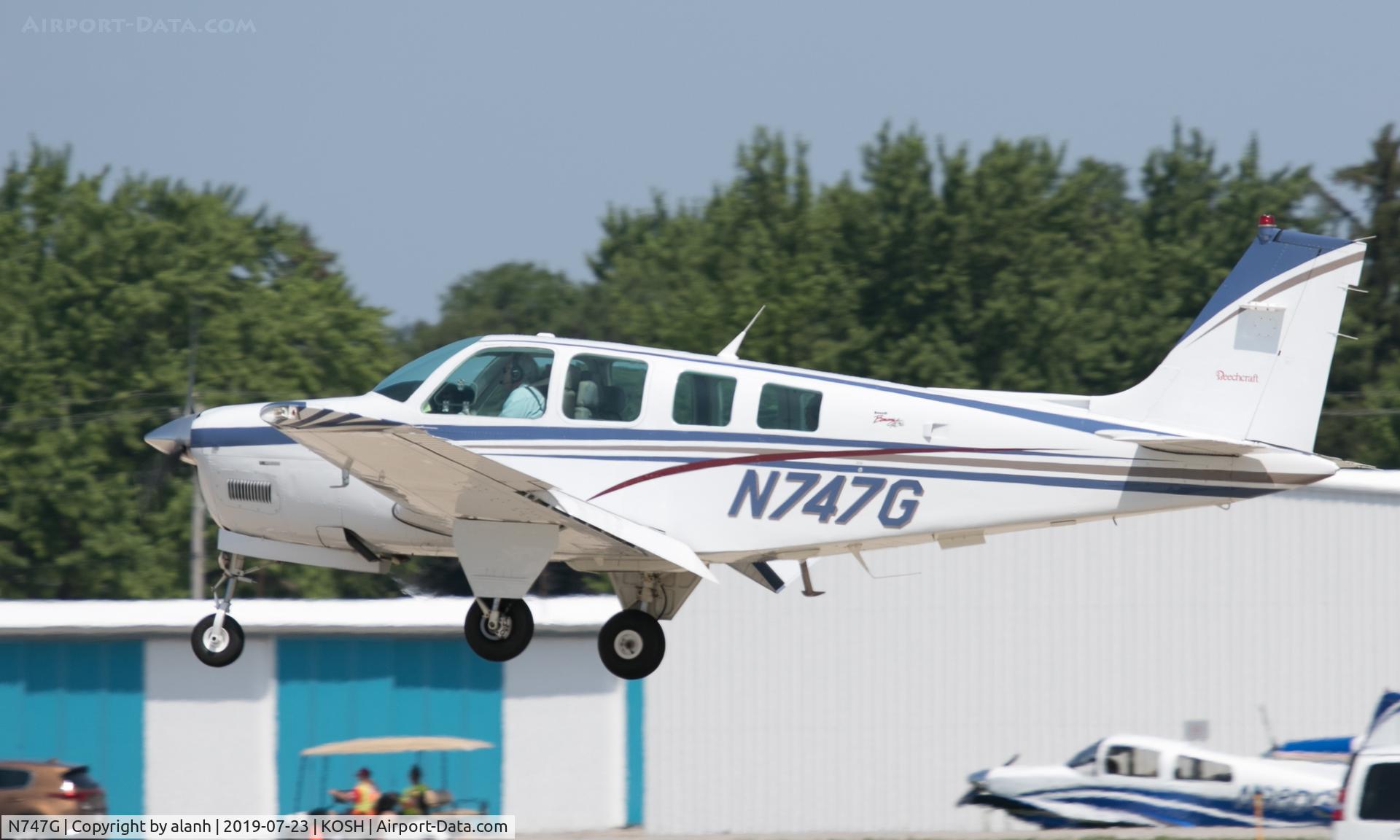 N747G, 1998 Raytheon Aircraft Company A36 Bonanza C/N E-3203, Arriving at AirVenture 2019