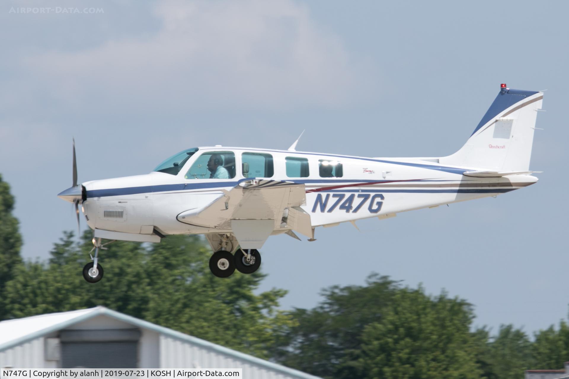 N747G, 1998 Raytheon Aircraft Company A36 Bonanza C/N E-3203, Arriving at AirVenture 2019