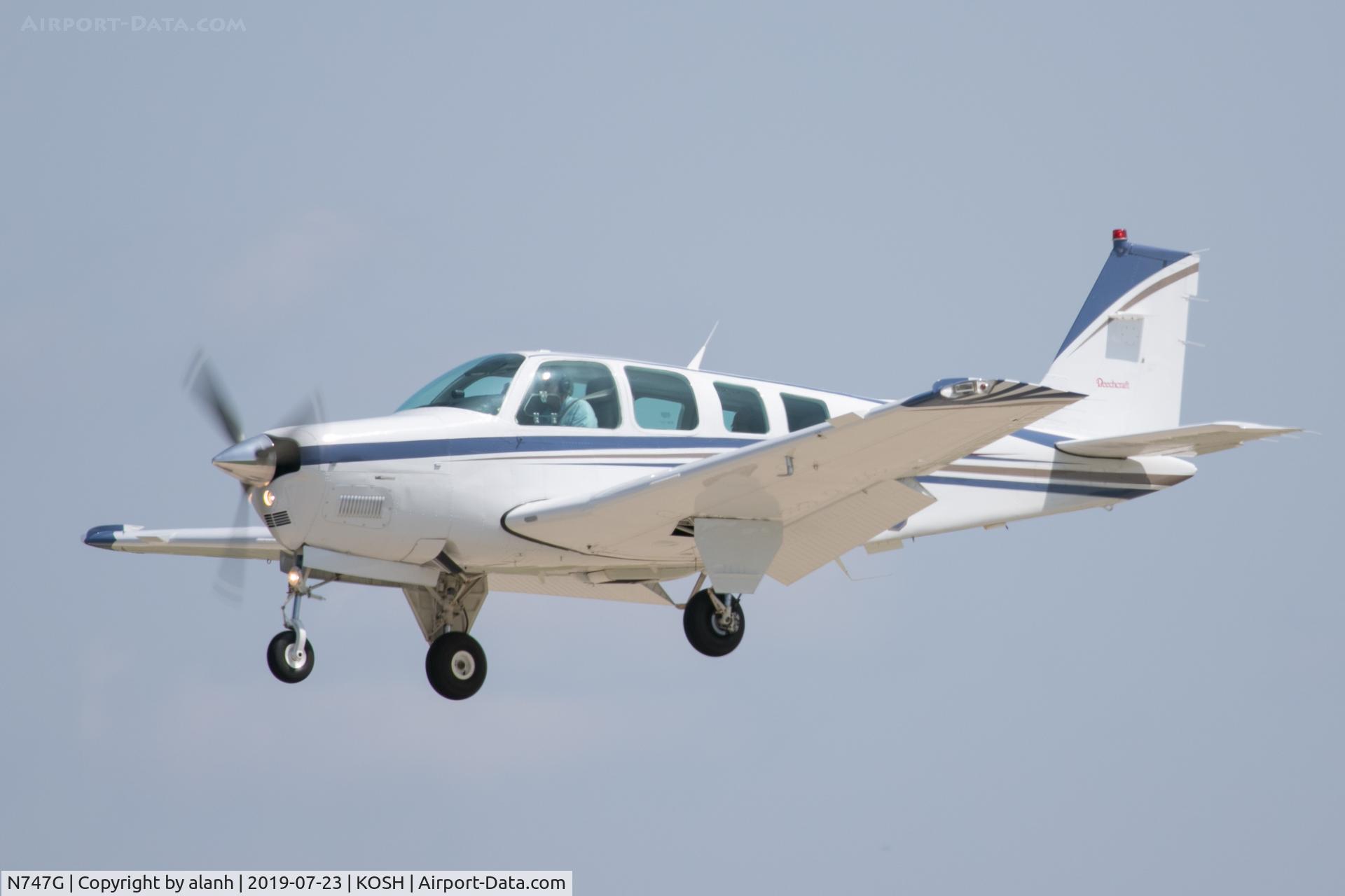 N747G, 1998 Raytheon Aircraft Company A36 Bonanza C/N E-3203, Arriving at AirVenture 2019