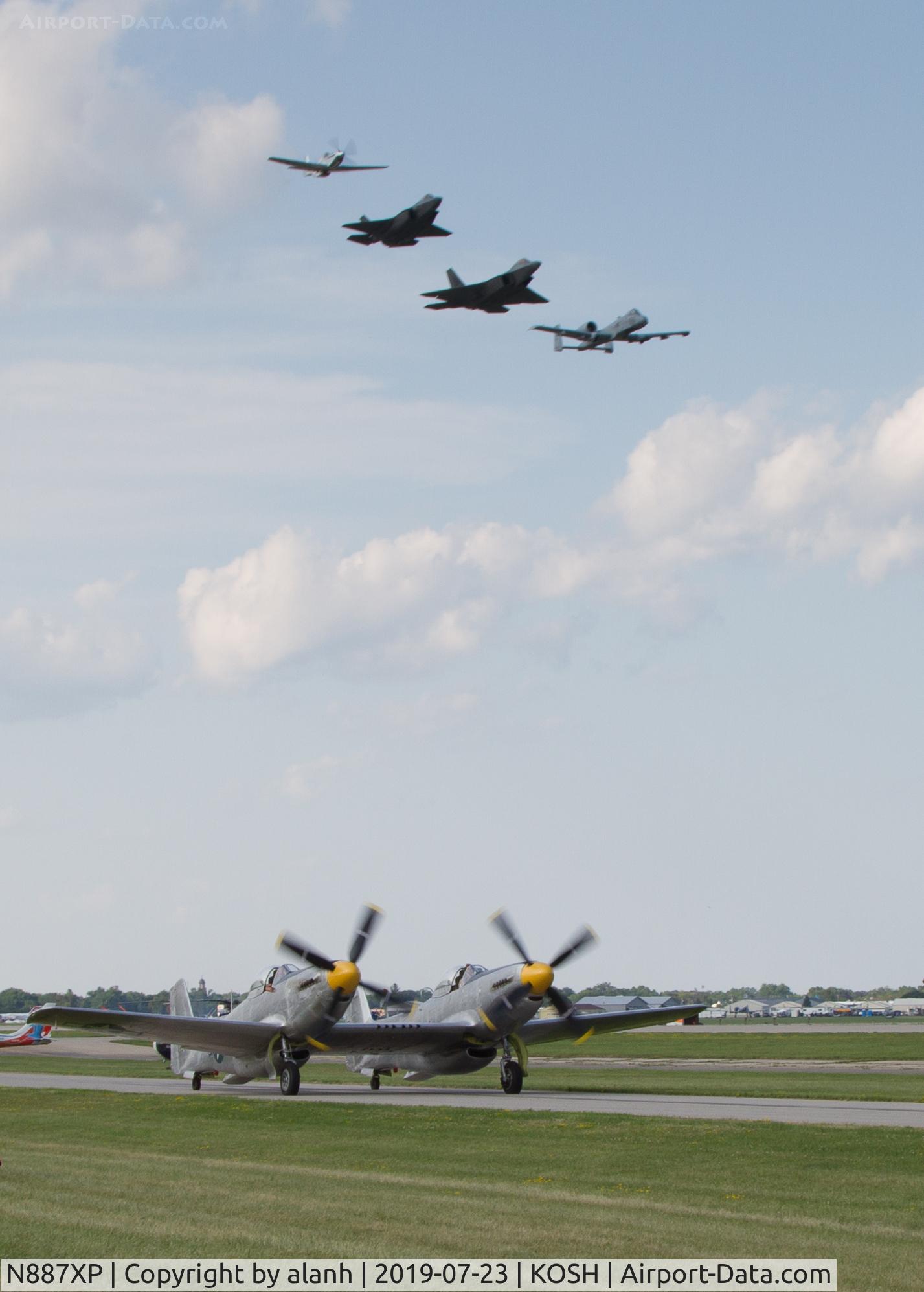 N887XP, 1944 North American XP-82-NA C/N 44-83887, Taxiing with overhead Heritage Flight, AirVenture 2019