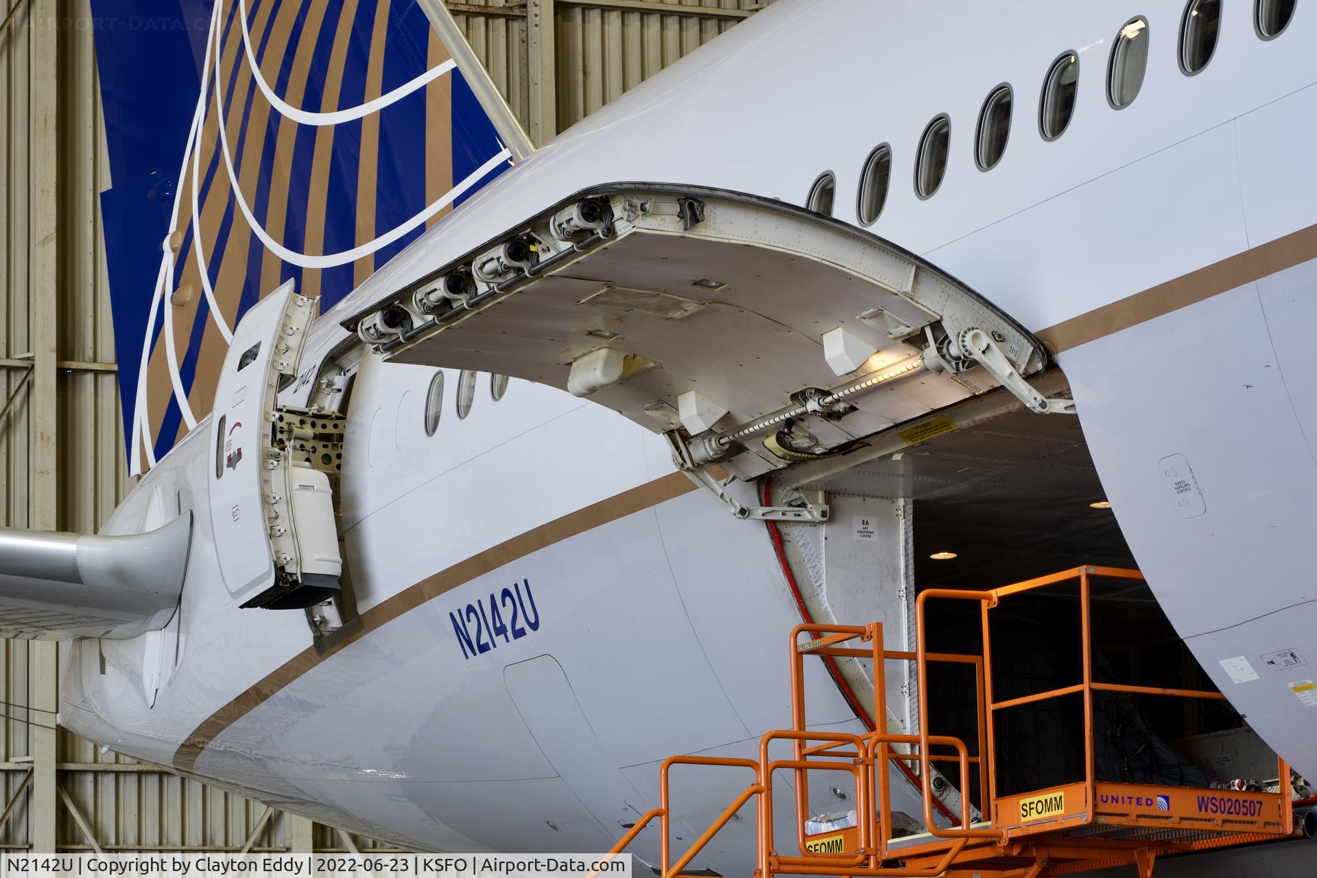 N2142U, 2017 Boeing 777-300/ER C/N 63722, Aft cargo door. SFO 2022.